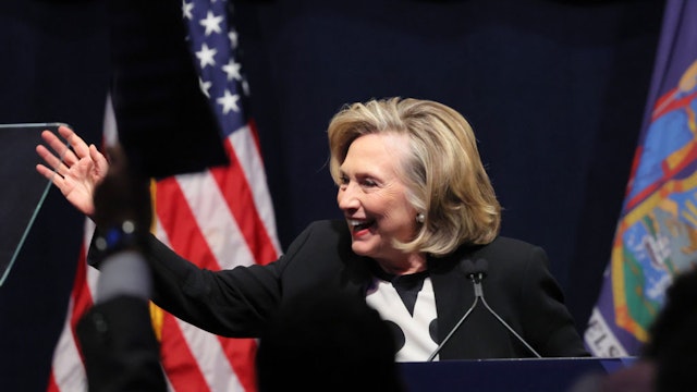 NEW YORK, NEW YORK - FEBRUARY 17:Former Secretary of State Hillary Clinton waves as she prepares to speak during the 2022 New York State Democratic Convention at the Sheraton New York Times Square Hotel on February 17, 2022 in New York City. Former Secretary of State Hillary Clinton gave the keynote address during the second day of the NYS Democratic Convention where the party organized the party's platform and nominated candidates for statewide offices that will be on the ballot this year including the nomination of Gov. Kathy Hochul and her Lt. Gov. Brian Benjamin. (Photo by Michael M. Santiago/Getty Images)