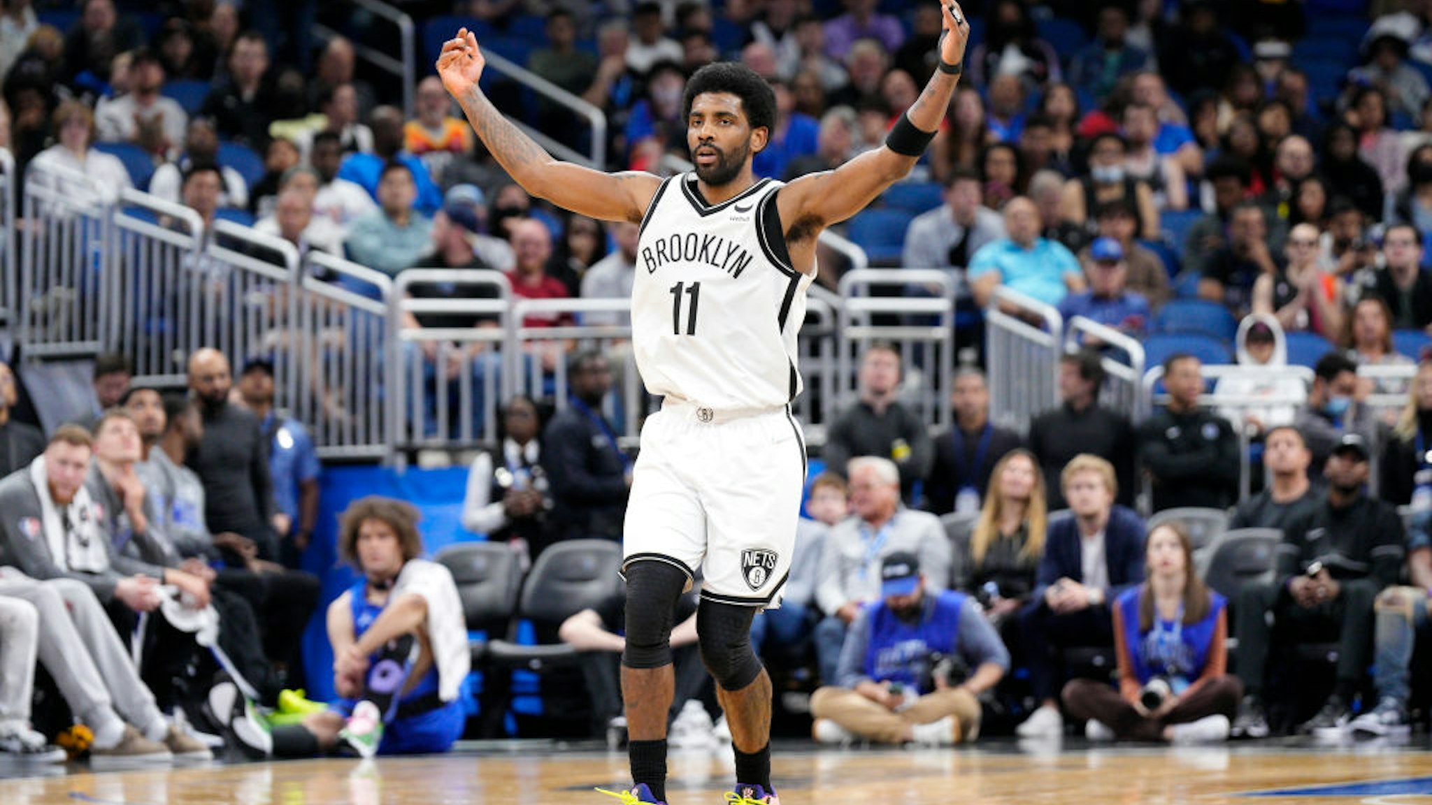 ORLANDO, FLORIDA - MARCH 15: Kyrie Irving #11 of the Brooklyn Nets celebrates after scoring against the Orlando Magic in the first half at Amway Center on March 15, 2022 in Orlando, Florida. NOTE TO USER: User expressly acknowledges and agrees that, by downloading and or using this photograph, User is consenting to the terms and conditions of the Getty Images License Agreement. (Photo by Mark Brown/Getty Images)