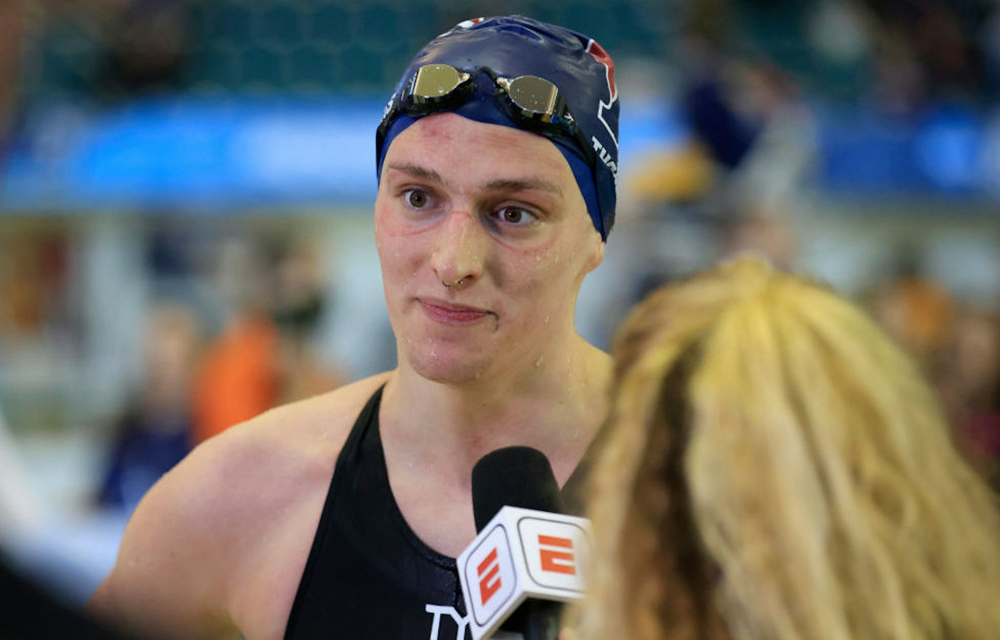 Transgender woman Lia Thomas of the University of Pennsylvania talks to a reporter after winning the 500-yard freestyle at the NCAA Division I Women's Swimming & Diving Championshipon March 17, 2022 in Atlanta, Georgia.