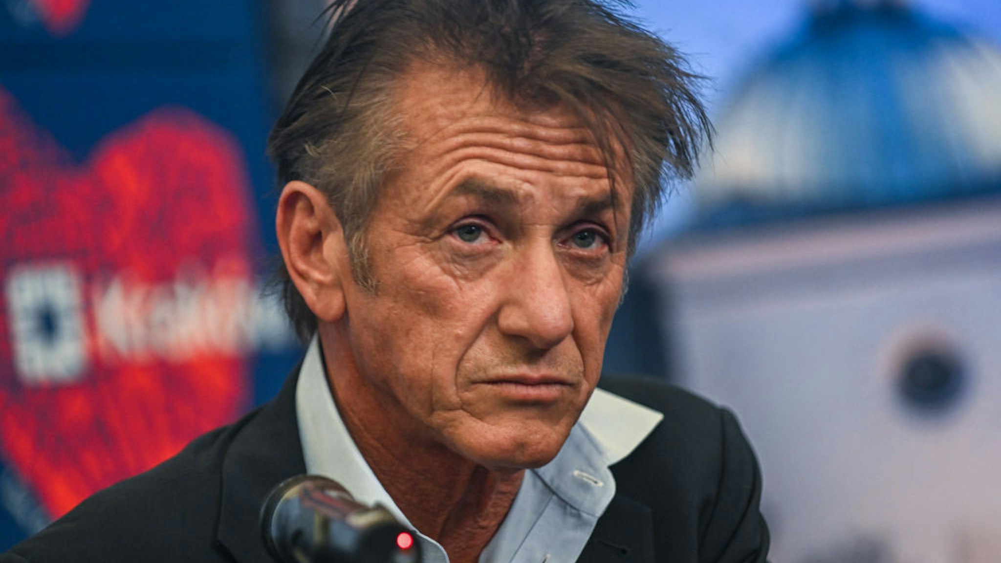 KRAKOW, POLAND - MARCH 23: Sean Penn and the Mayor of Krakow, Jacek Majchrowski (not seen) speak to the press after signing a humanitarian contract at the City Hall on March 23, 2022 in Krakow, Poland. Sean Penn founded the CORE (Community Organized Relief Effort) foundation in 2010 to help the victims of the Haiti earthquake, and it is now assisting Ukrainian refugees in Poland. (Photo by Omar Marques/Getty Images)
