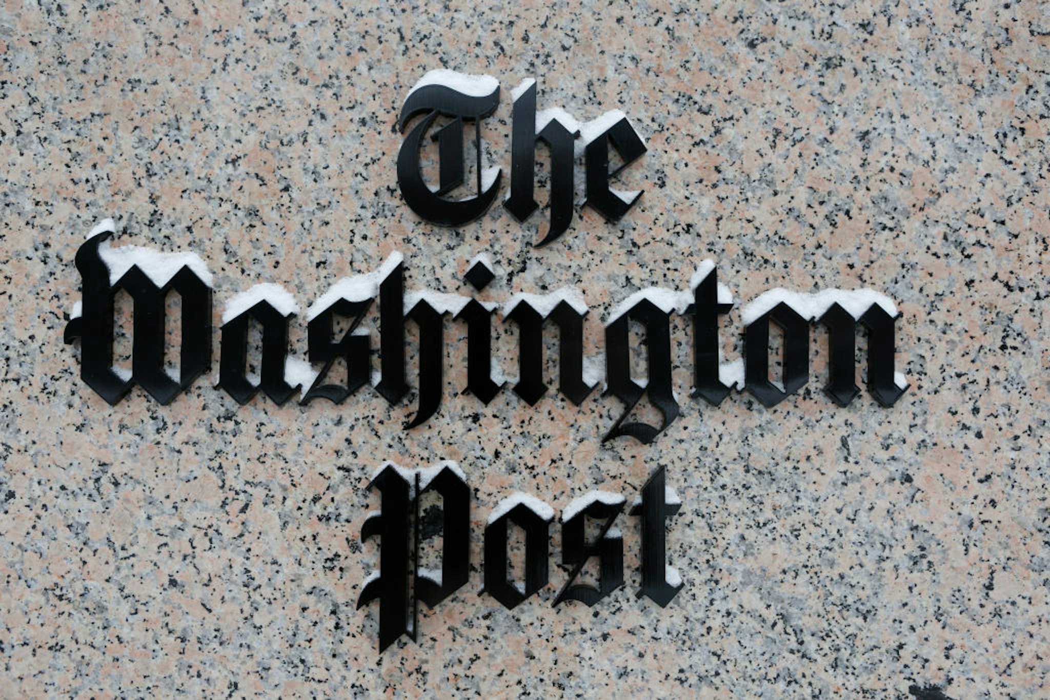 WASHINGTON, DC - JANUARY 23: Washington Post logo outside of the building covered with snow. (Photo by Oliver Contreras/For The Washington Post via Getty Images)