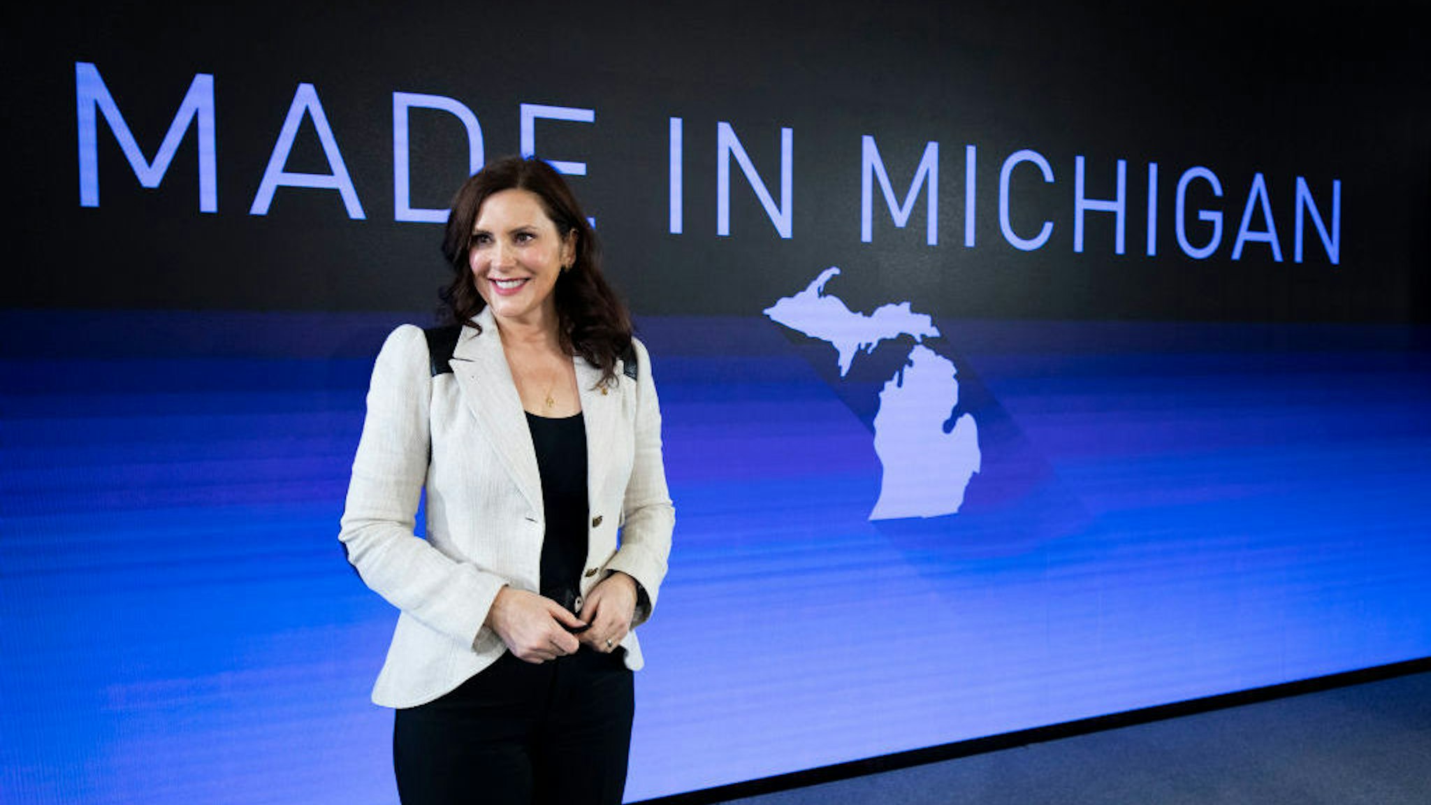 LANSING, MI - JANUARY 25: Michigan Governor Gretchen Whitmer poses for a photo after an event at which General Motors announced they are making a $7 billion investment, the largest in the company’s history, in electric vehicle and battery production in the state of Michigan on January 25, 2022 in Lansing, Michigan. The investment will be used at 4 facilities in Michigan and will create 4,000 jobs. (Photo by Bill Pugliano/Getty Images)