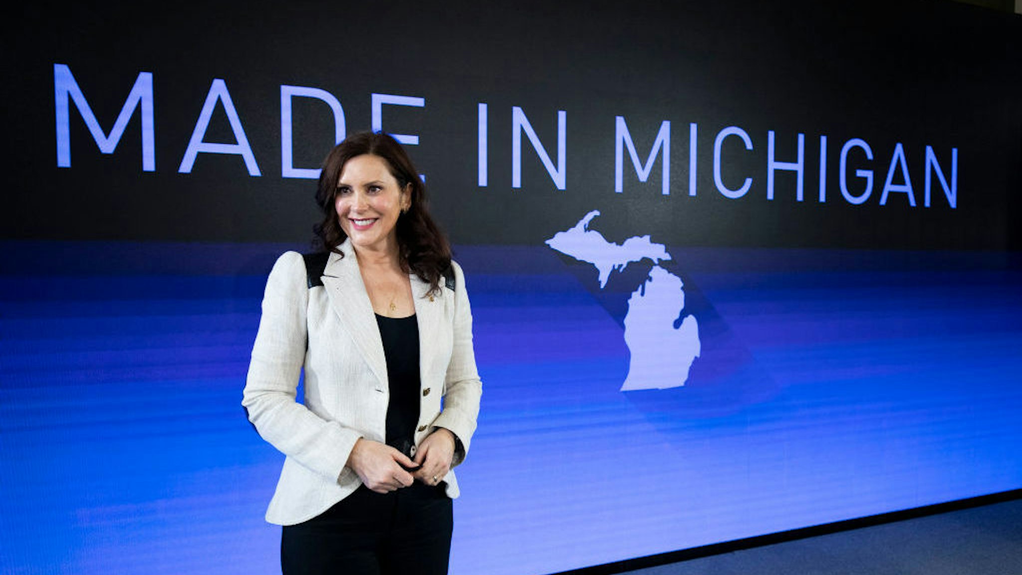 LANSING, MI - JANUARY 25: Michigan Governor Gretchen Whitmer poses for a photo after an event at which General Motors announced they are making a $7 billion investment, the largest in the company’s history, in electric vehicle and battery production in the state of Michigan on January 25, 2022 in Lansing, Michigan. The investment will be used at 4 facilities in Michigan and will create 4,000 jobs. (Photo by Bill Pugliano/Getty Images)