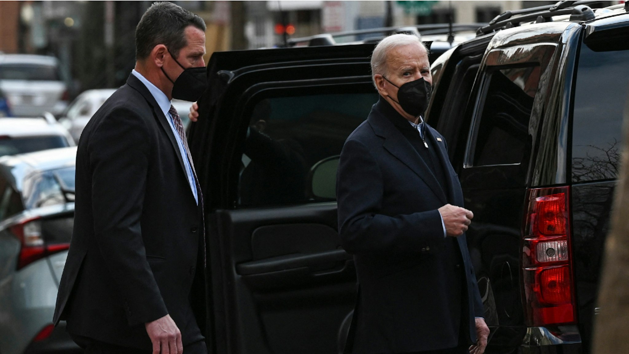 US President Joe Biden walks out of the Holy Trinity Church in Washington, DC, on March 27, 2022.