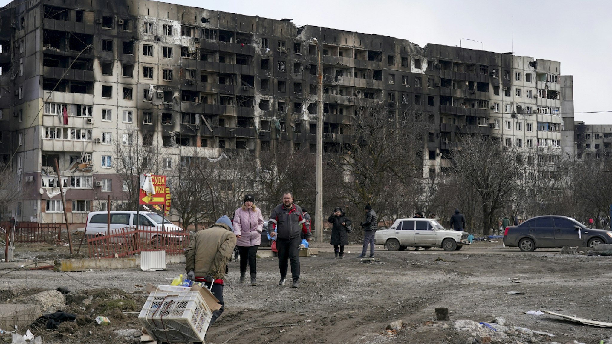 MARIUPOL, UKRAINE - MARCH 20: Civilians trapped in Mariupol city under Russian attacks, are evacuated in groups under the control of pro-Russian separatists, through other cities, in Mariupol, Ukraine on March 20, 2022.