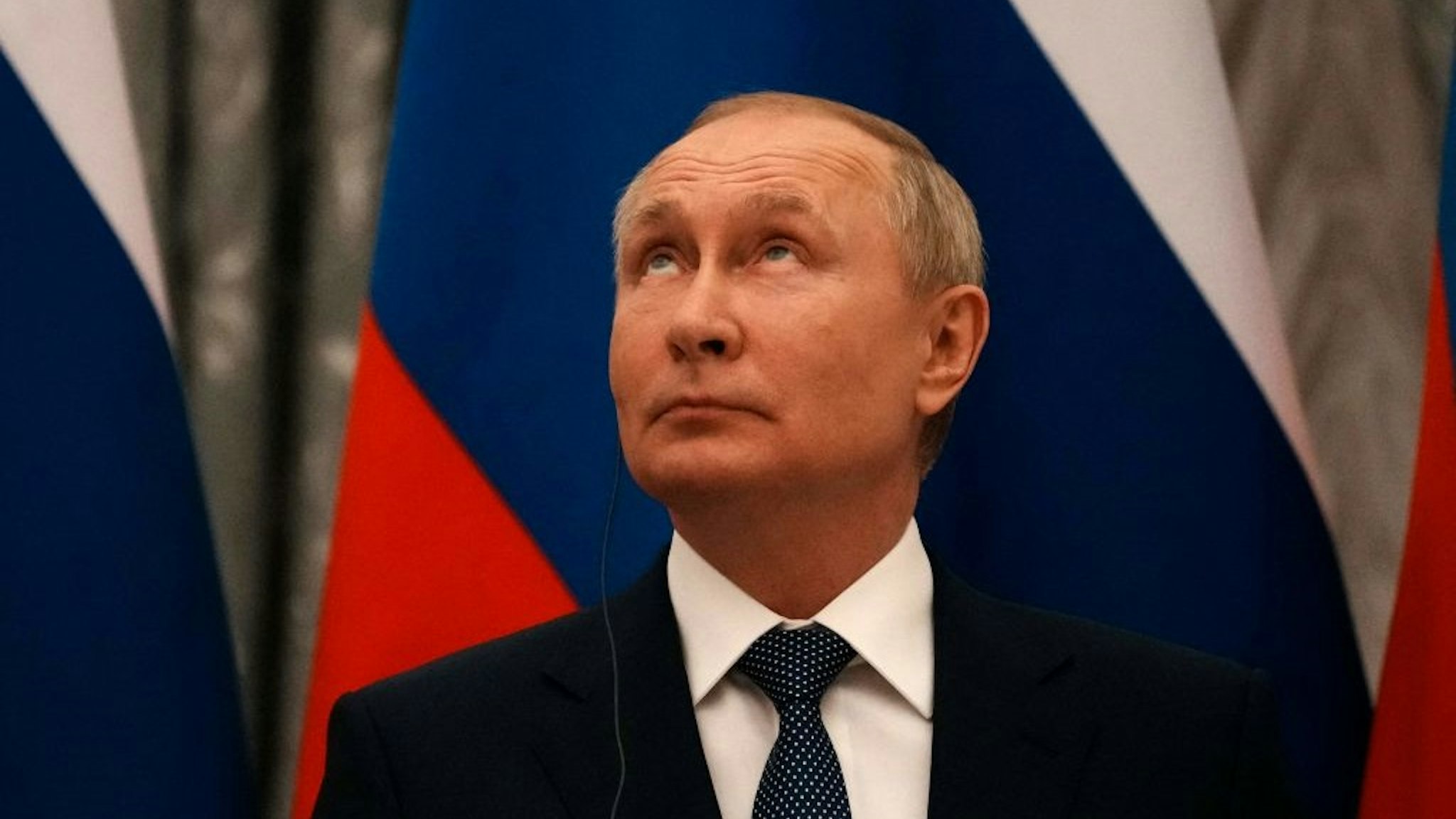 Russian President Vladimir Putin looks on during a press conference after meeting with French President in Moscow, on February 7, 2022.