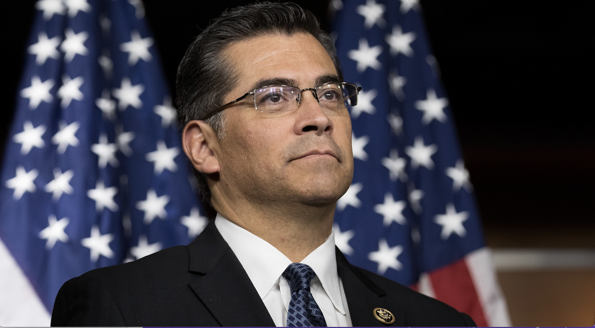 Rep. Xavier Becerra (D-CA) listens during a news conference to discuss the rhetoric of presidential candidate Donald Trump, at the U.S. Capitol, May 11, 2016, in Washington, DC.