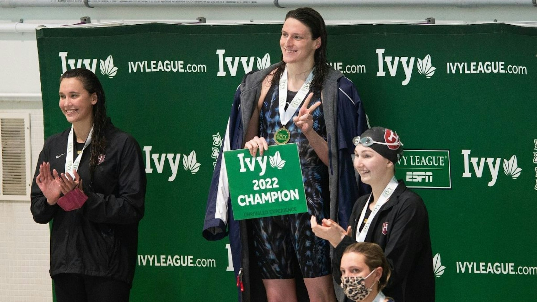 University of Pennsylvania swimmer Lia Thomas smiles on the podium after winning the 200 yard freestyle during the 2022 Ivy League Women's Swimming and Diving Championships at Blodgett Pool on February 18, 2022 in Cambridge, Massachusetts.