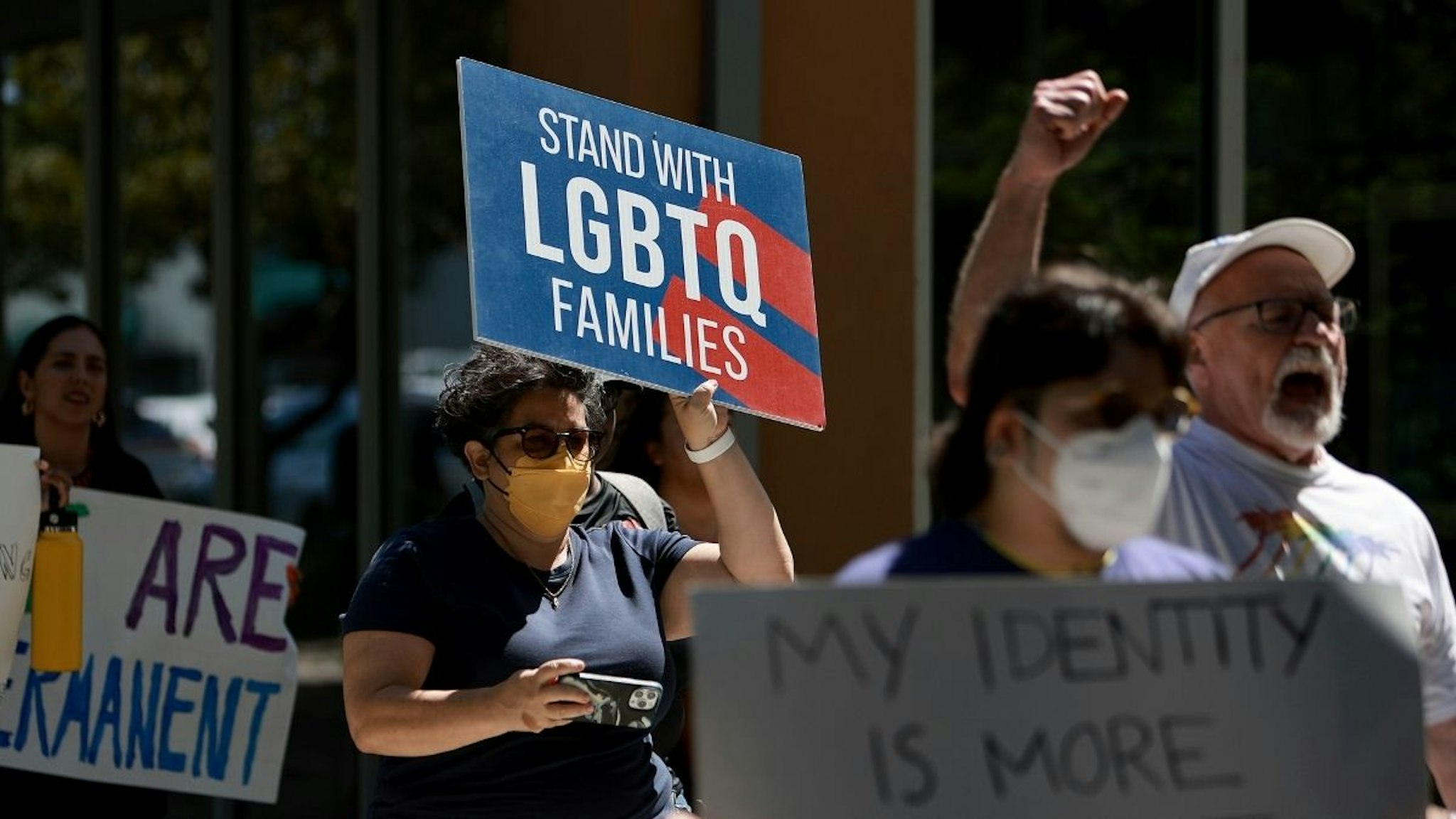 People protest in front of Florida State Senator Ileana Garcia's (FL-R) office after the passage of the Parental Rights in Education bill, dubbed the "Don't Say Gay" bill by LGBTQ activists on March 09, 2022 in Miami, Florida.