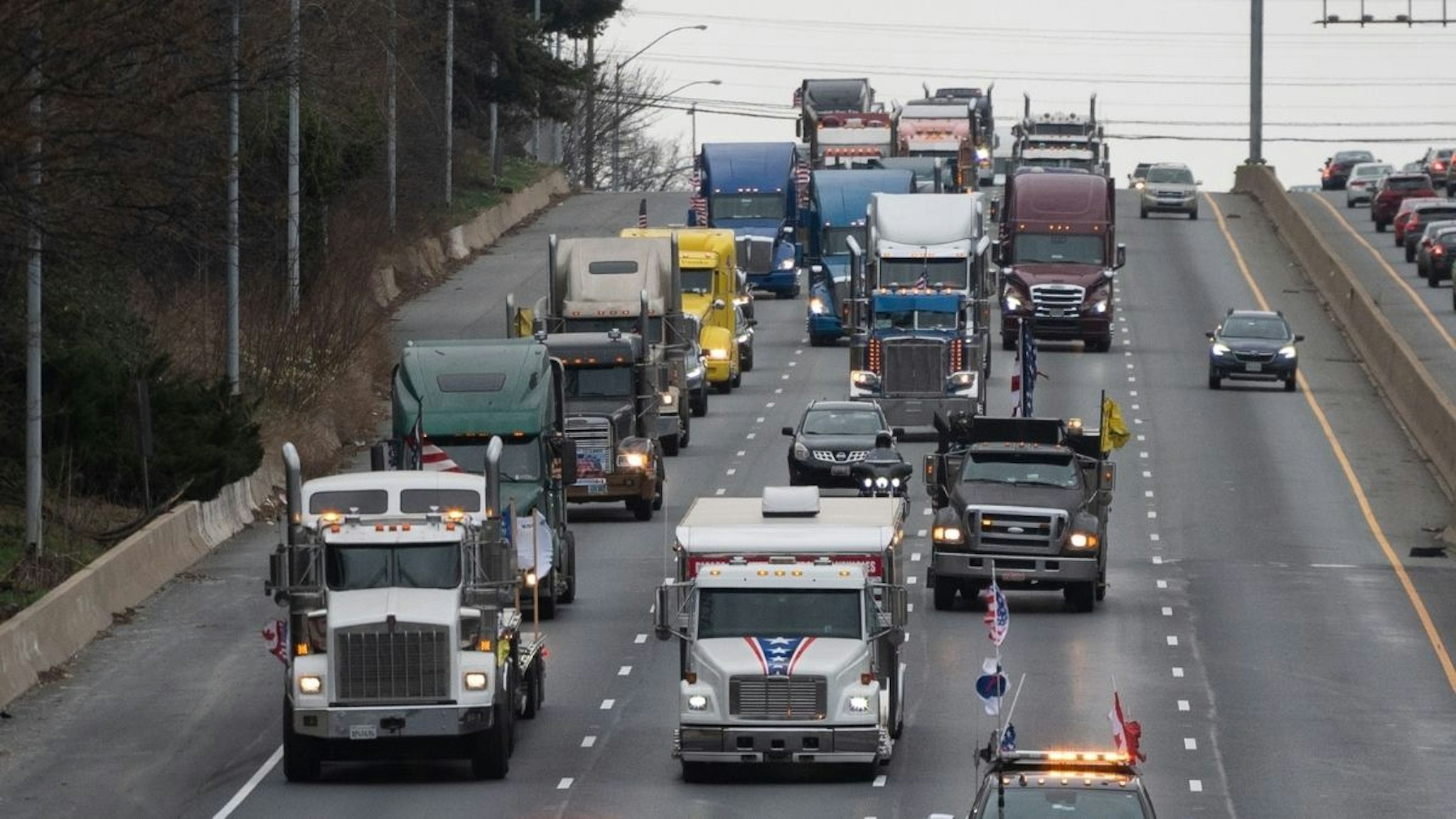 Trucks on I-495 while circling the Washington Beltway during "The People's Convoy" event in Silver Spring, Maryland, U.S., on Monday, March 7, 2022.