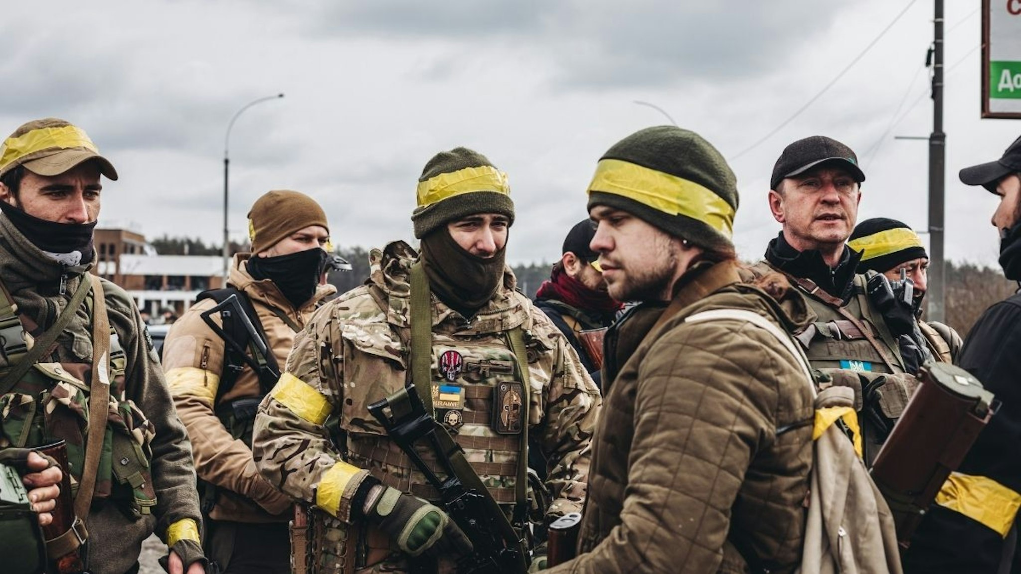 Ukrainian army soldiers talk together on March 4, 2022, in Irpin, Ukraine. Ukraine has been in the midst of an armed conflict for nine days following the start of attacks by Russia on February 24.