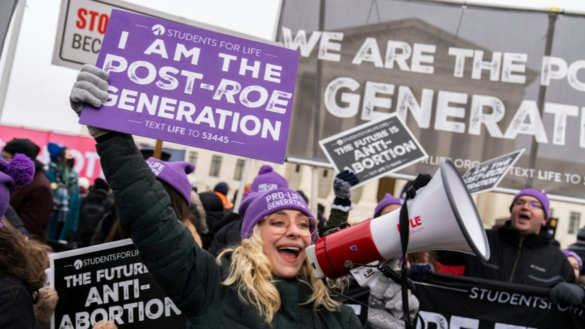 Demonstrators walk on First Street during the annual 49th March for Life anti-abortion demonstration on Capitol Hill in Friday, January 21, 2022.