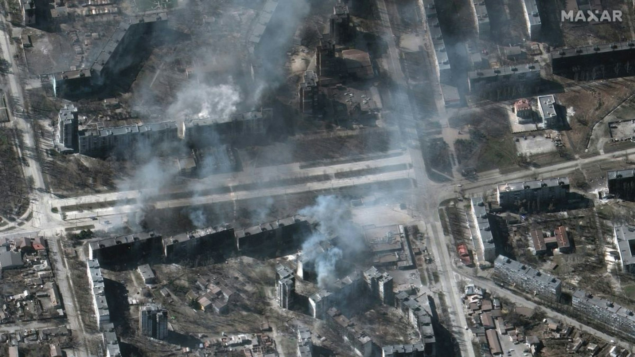 Maxar satellite imagery of additional burning residential apartment buildings in Mariupol, Ukraine.