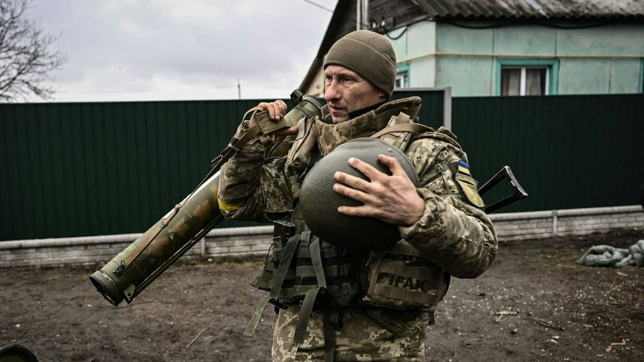 An Ukrainian soldier holds an anti-tank launcher at a frontline, northeast of Kyiv on March 3, 2022.