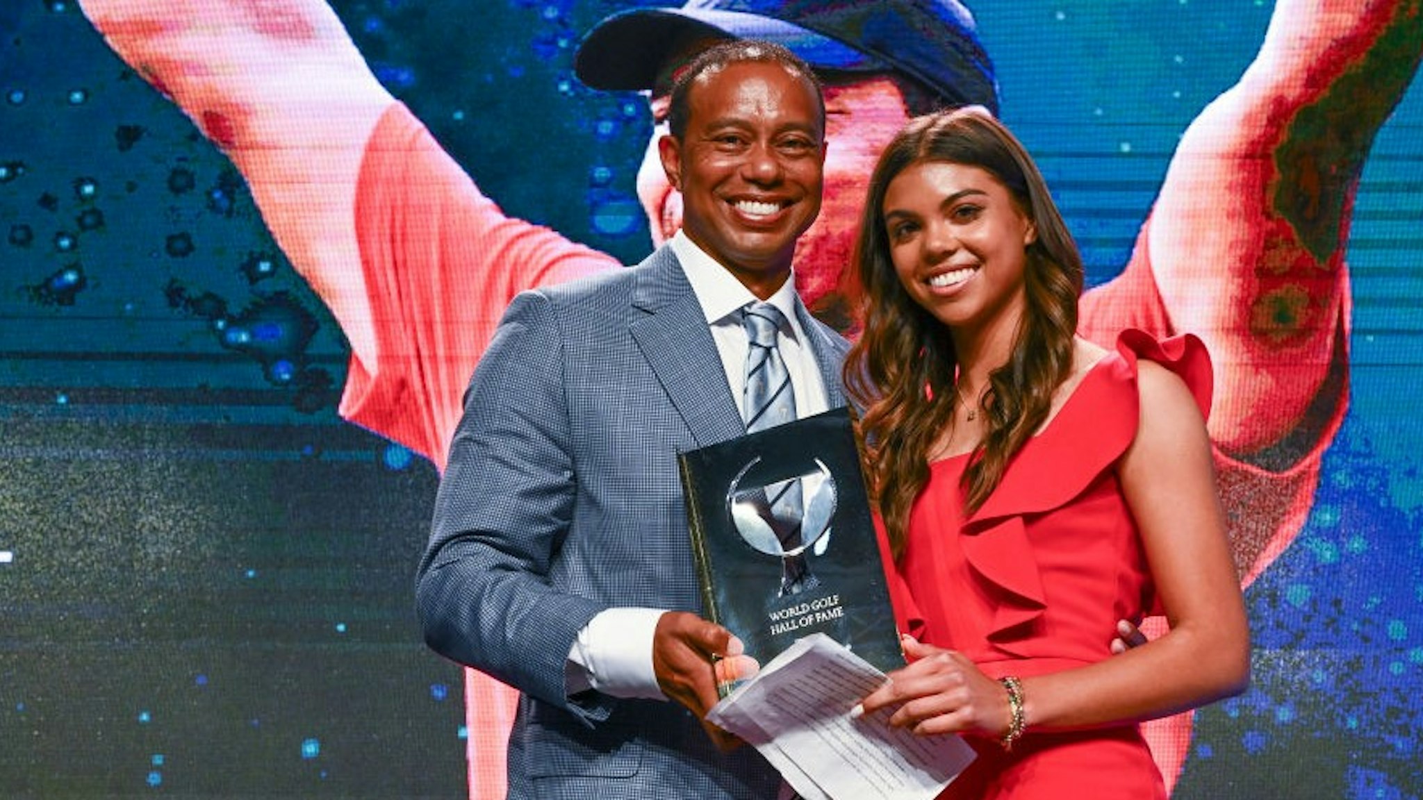 PONTE VEDRA BEACH, FL - MARCH 09: Tiger Woods and his daughter Sam, pose on stage during the World Golf Hall of Fame Induction Ceremony prior to THE PLAYERS Championship at PGA TOUR Global Home on March 9, 2022, in Ponte Vedra Beach, FL. (Photo by