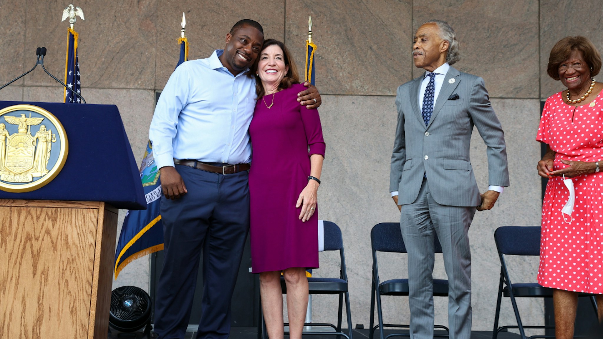 NEW YORK, NY - AUGUST 26: New York Governor Kathy Hochul (2nd L), American civil rights activist Al Sharpton (2nd R) and US Senator Brian Benjamin (L) are seen after speaking in front of the State office building in the hearth of Harlem, New York City, United States on August 26, 2021.