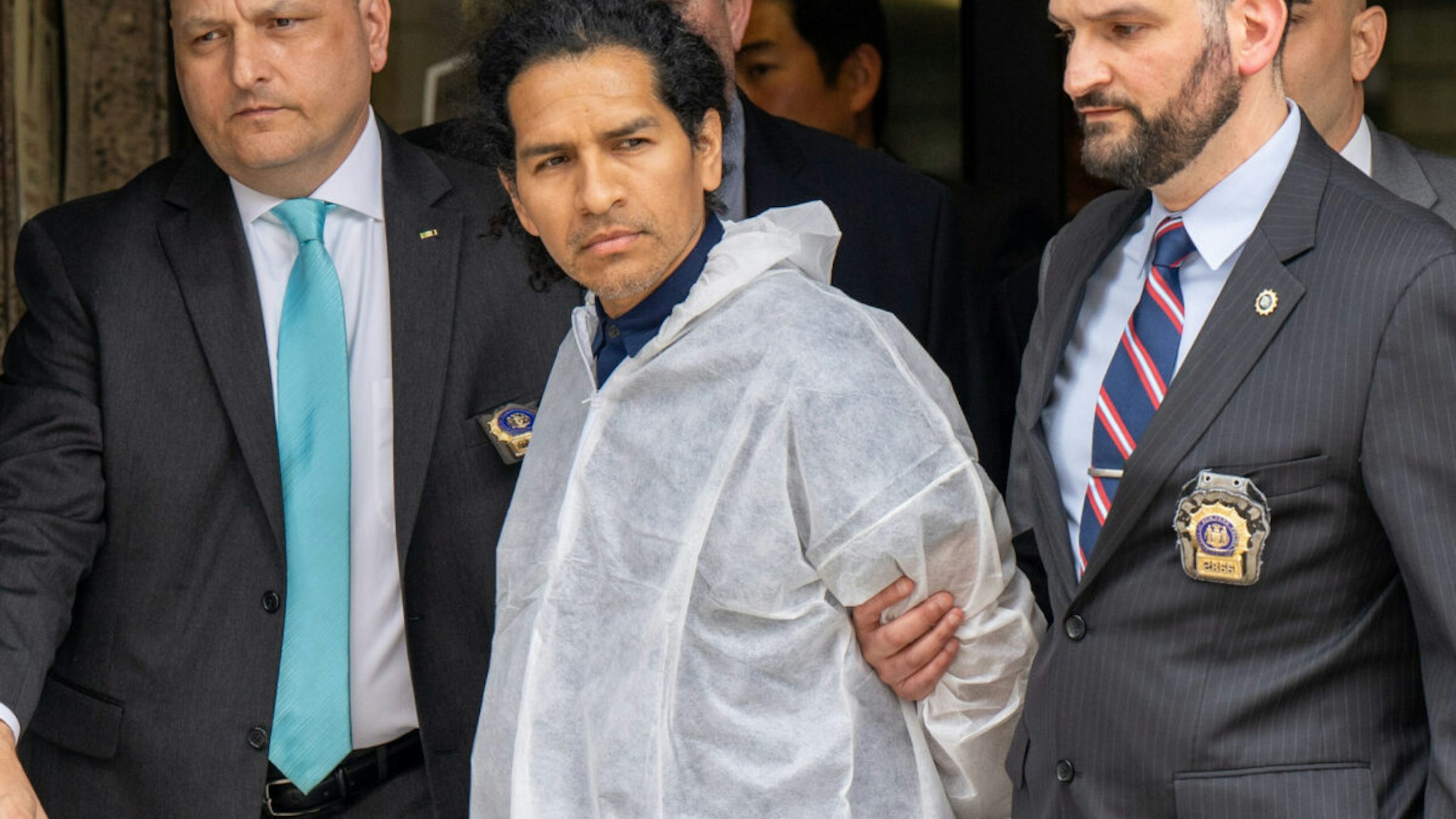 David Bonola, 44, a suspect in the gruesome multi stabbing murder of 51yr old Orsolya Gaal, is taken from the NYPD 112th Precinct Station House on Austin Street in Queens on Thursday April 21, 2022