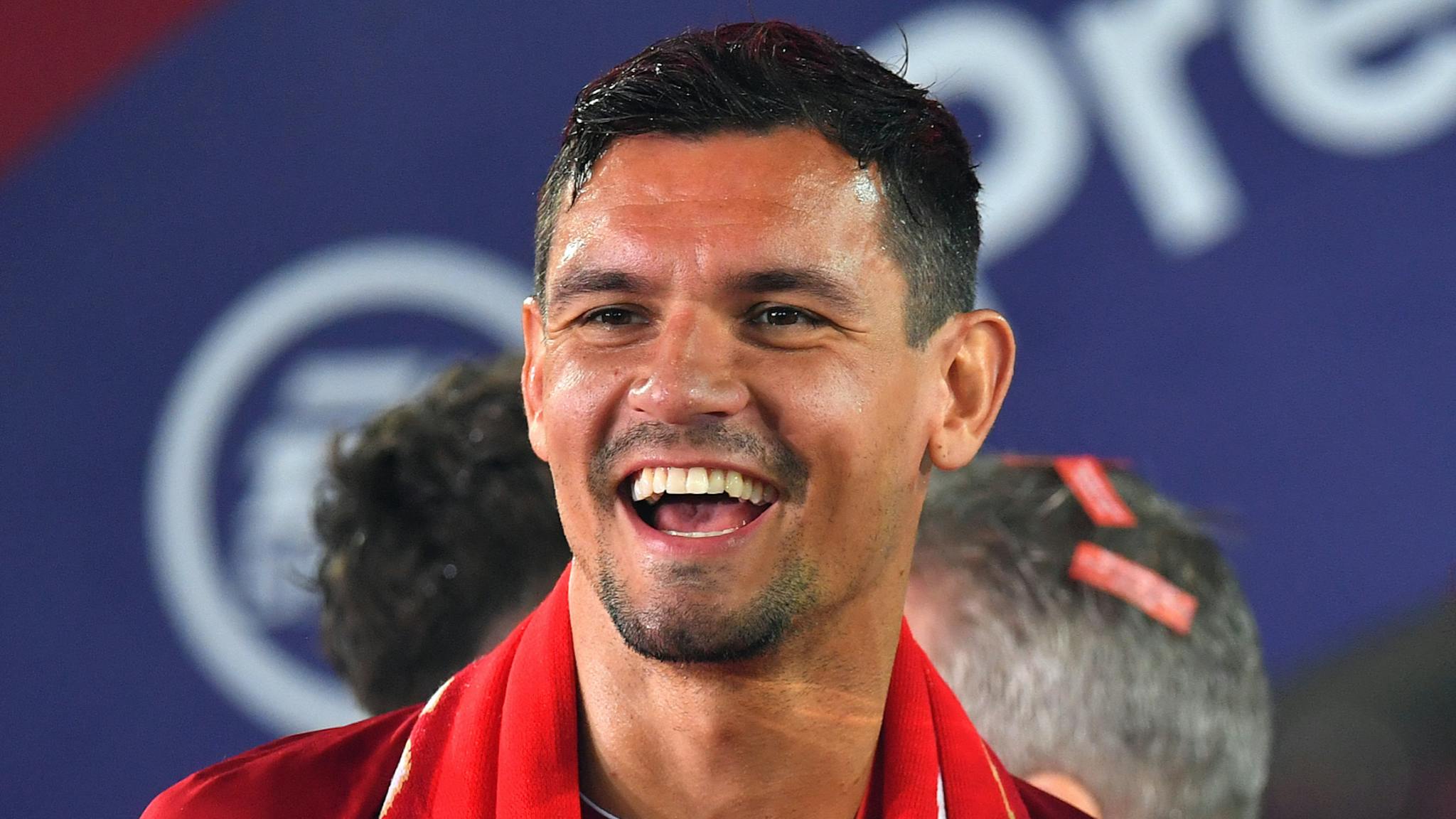 Dejan Lovren-2 Dejan Lovren and Mohamed Salah of Liverpool celebrate with The Premier League trophy following the Premier League match between Liverpool FC and Chelsea FC at Anfield on July 22, 2020 in Liverpool, England. Football Stadiums around Europe remain empty due to the Coronavirus Pandemic as Government social distancing laws prohibit fans inside venues resulting in all fixtures being played behind closed doors.