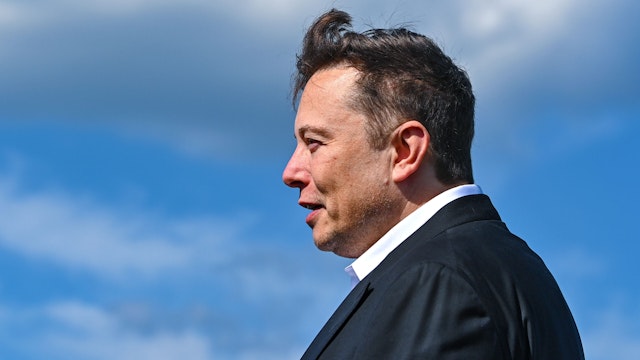 03 September 2020, Brandenburg, Grünheide: Elon Musk, head of Tesla, stands on the construction site of the Tesla Gigafactory. In Grünheide near Berlin, a maximum of 500,000 vehicles per year are to roll off the assembly line starting in July 2021. According to the plans of the car manufacturer, the maximum is to be reached as quickly as possible.