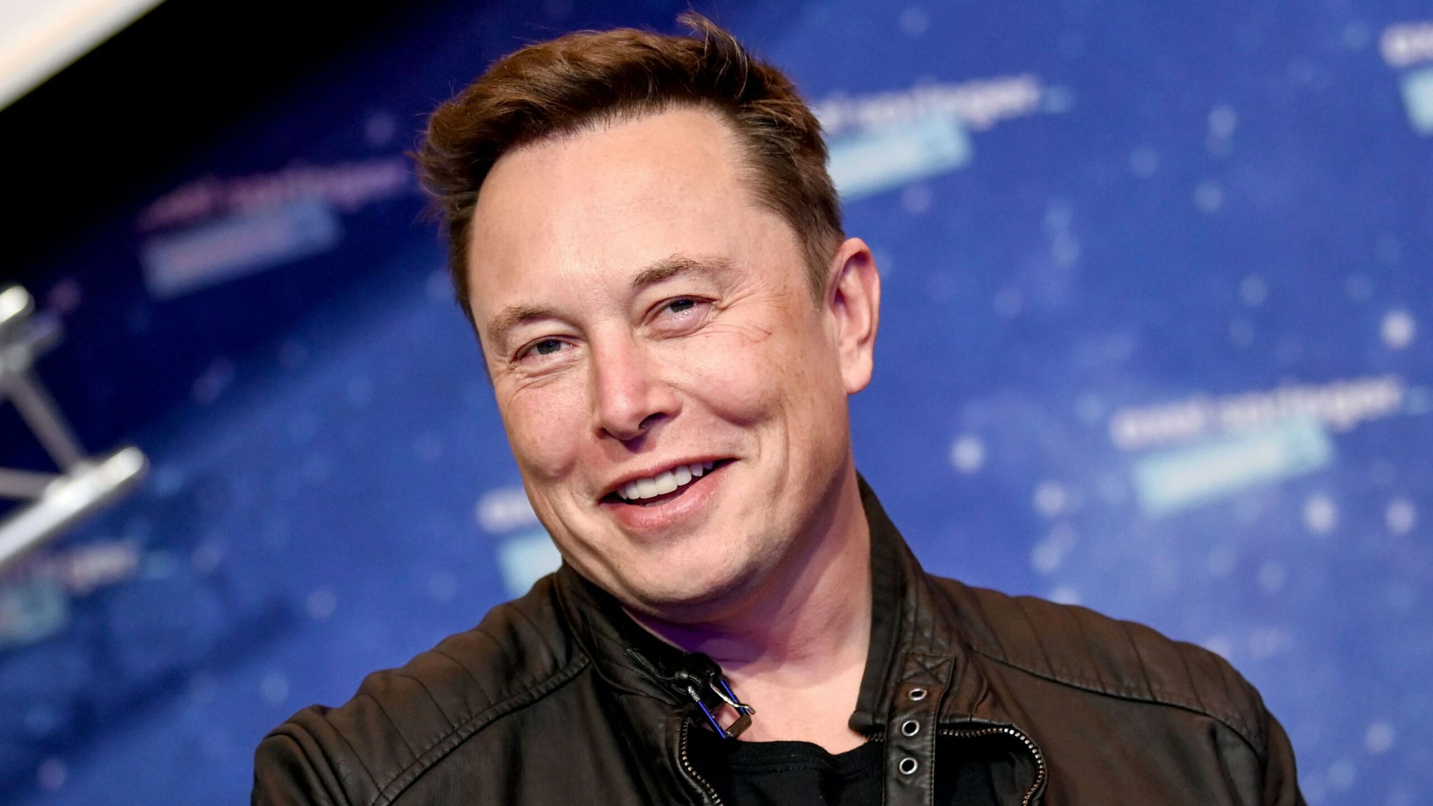 SpaceX owner and Tesla CEO Elon Musk poses as he arrives on the red carpet for the Axel Springer Awards ceremony, in Berlin, on December 1, 2020.
