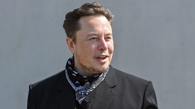 13 August 2021, Brandenburg, Grünheide: Elon Musk, Tesla CEO, stands at a press event on the grounds of the Tesla Gigafactory. The first vehicles are to roll off the production line in Grünheide near Berlin from the end of 2021. The US company plans to build around 500,000 units of the compact Model 3 and Model Y series here each year.