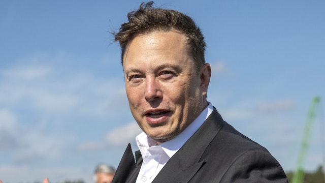 GRUENHEIDE, GERMANY - SEPTEMBER 03: Tesla head Elon Musk talks to the press as he arrives to to have a look at the construction site of the new Tesla Gigafactory near Berlin on September 03, 2020 near Gruenheide, Germany. Musk is currently in Germany where he met with vaccine maker CureVac on Tuesday, with which Tesla has a cooperation to build devices for producing RNA vaccines, as well as German Economy Minister Peter Altmaier yesterday.
