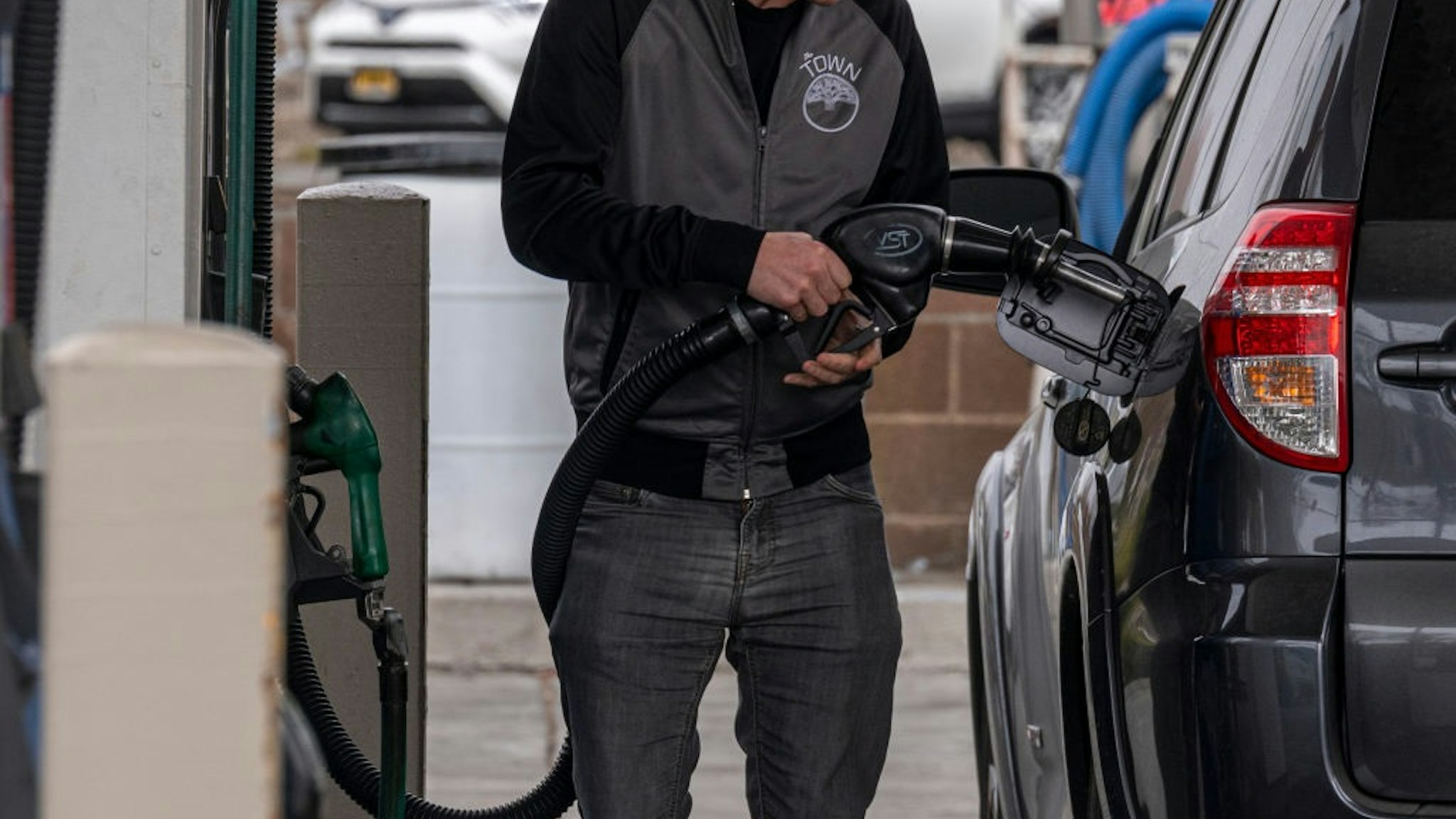A driver fuels a vehicle a gas station in Richmond, California, U.S., on Thursday, March 24, 2022.
