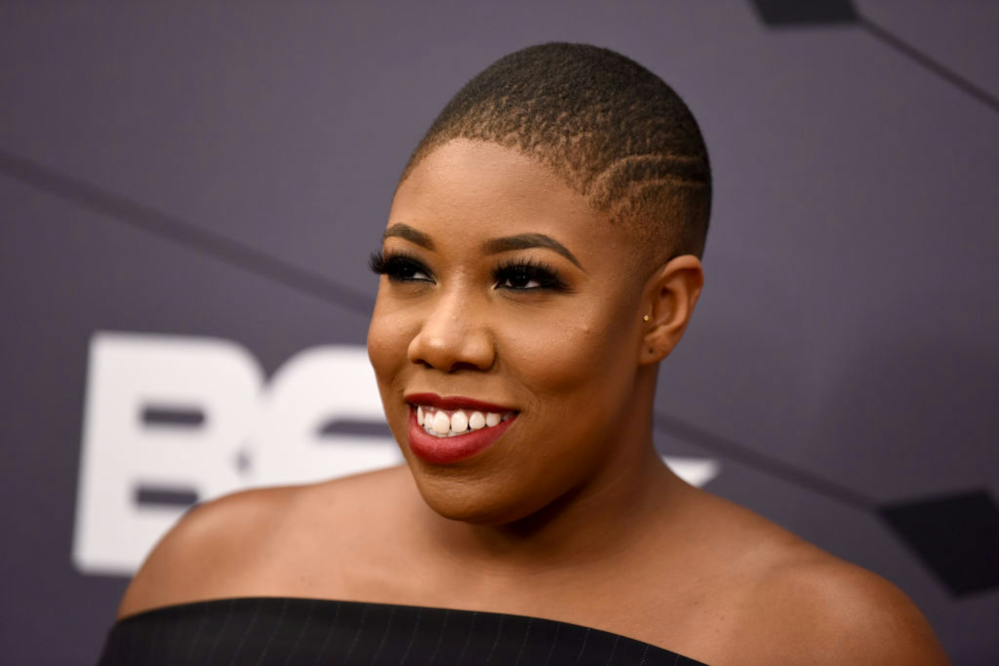 NEWARK, NJ - AUGUST 26: Symone Sanders attends the Black Girls Rock! 2018 Red Carpet at NJPAC on August 26, 2018 in Newark, New Jersey. (Photo by Dave Kotinsky/Getty Images for BET)