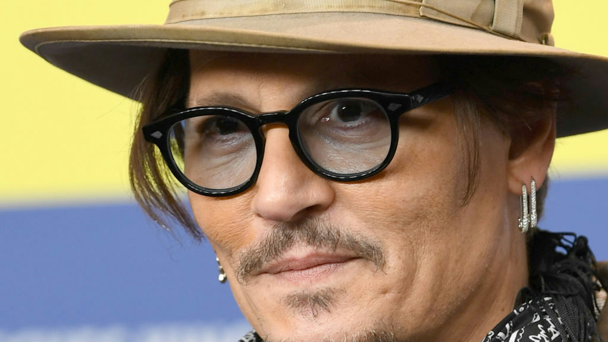 Actor Johnny Depp attends the press conference for Minamata during the 70th Berlin International Film Festival at the Grand Hyatt Berlin.
