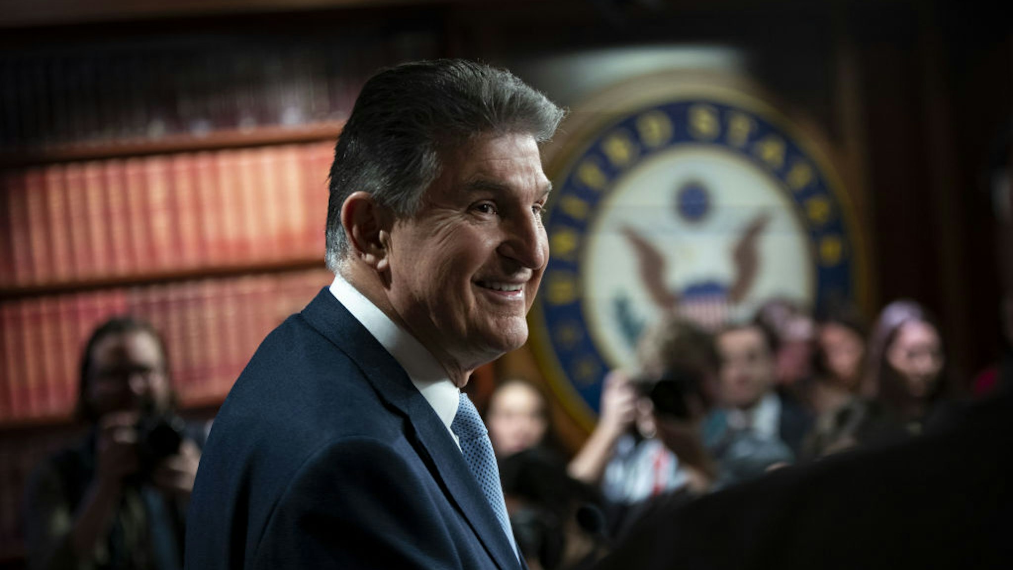 Senator Joe Manchin, a Democrat from West Virginia, smiles while speaking during a news conference about a bill to ban Russian energy imports, at the U.S. Capitol in Washington, D.C., U.S., on Thursday, March 3, 2022. The White House is asking Congress for $32.5 billion in emergency funding to boost its response to Russia's invasion of Ukraine and tackle the ongoing fight against the coronavirus. Photographer: Al Drago/Bloomberg via Getty Images