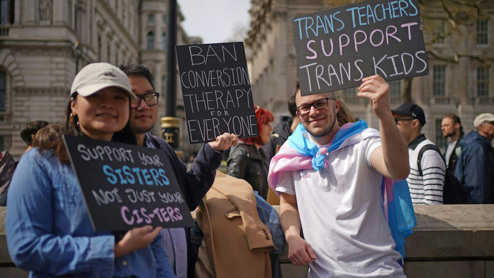 People take part in a protest outside Downing Street in London, over transgender people not being included in plans to ban conversion therapy. Picture date: Sunday April 10, 2022.