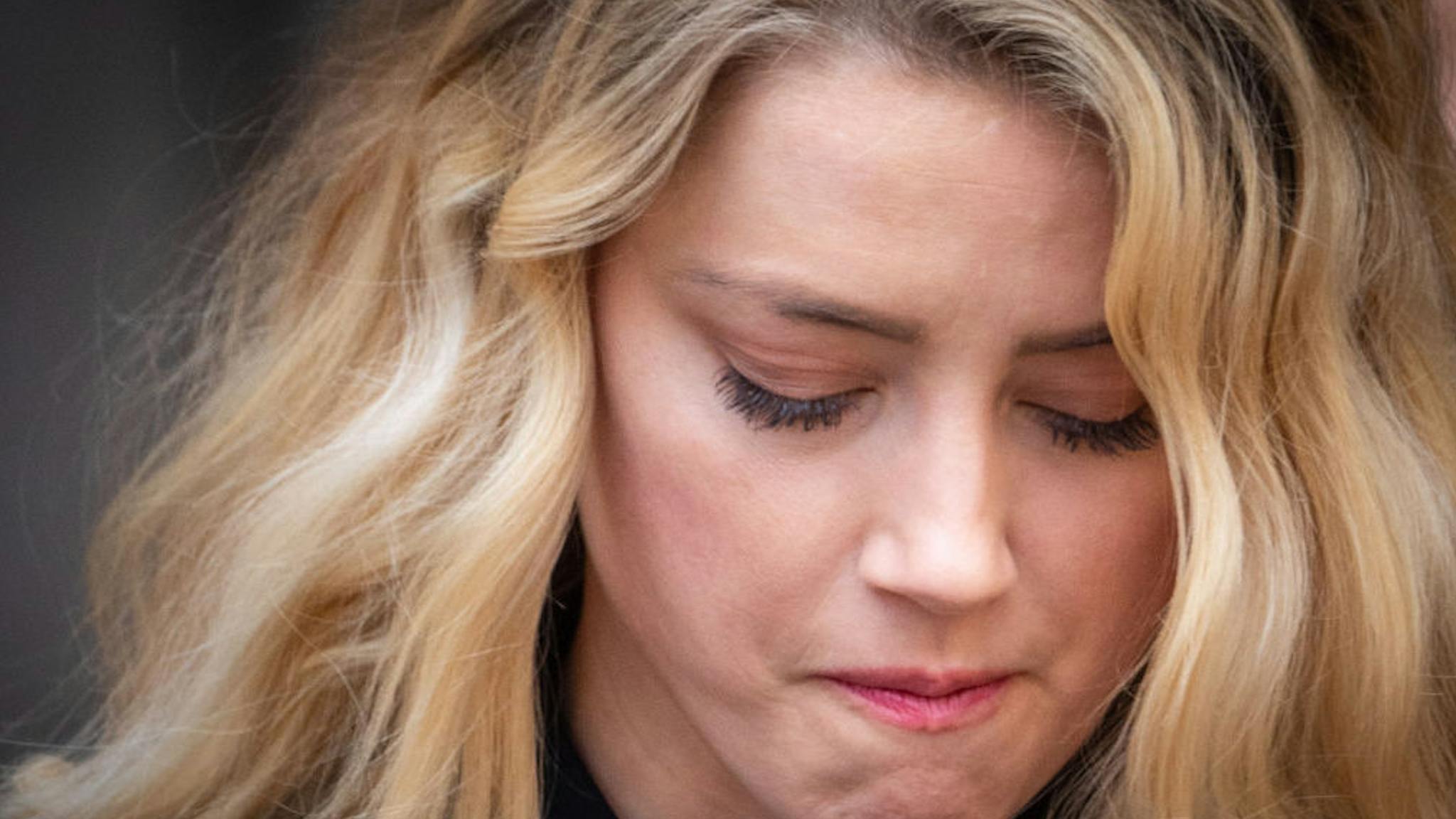 Final Day Of Johnny Depp Libel Trial Amber Heard gives a speech after the trial at the Royal Courts of Justice, Strand on July 28, 2020 in London, England. Hollywood Actor Johnny Depp is suing News Group Newspapers (NGN) and the Sun's executive editor, Dan Wootton, over an article published in 2018 that referred to him as a "wife beater" during his marriage to actor Amber Heard.