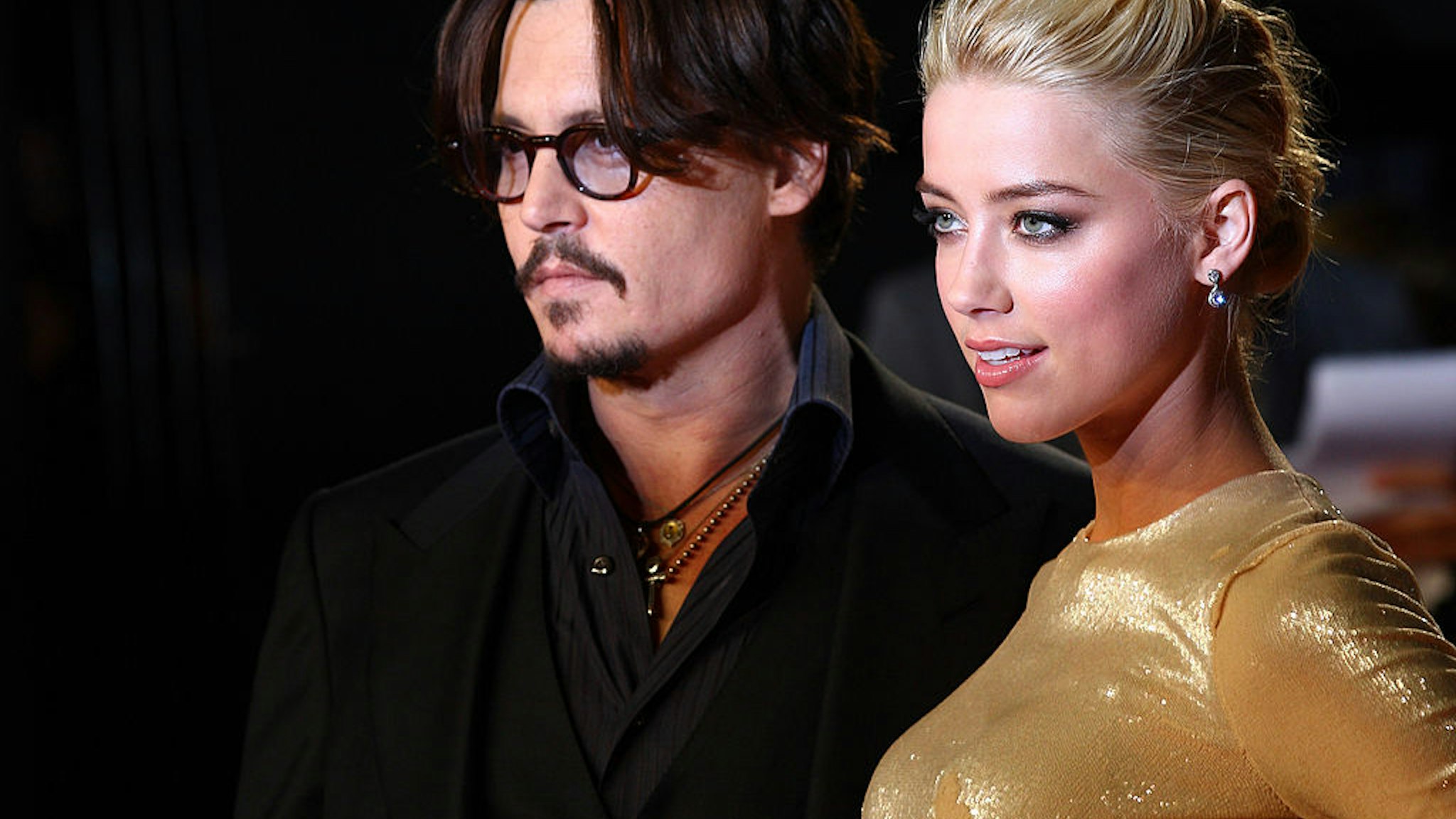 Johnny Depp and Amber Heard attend the European Premiere of 'The Rum Diary' at Odean, Kensington on November 3, 2011 in London, England.