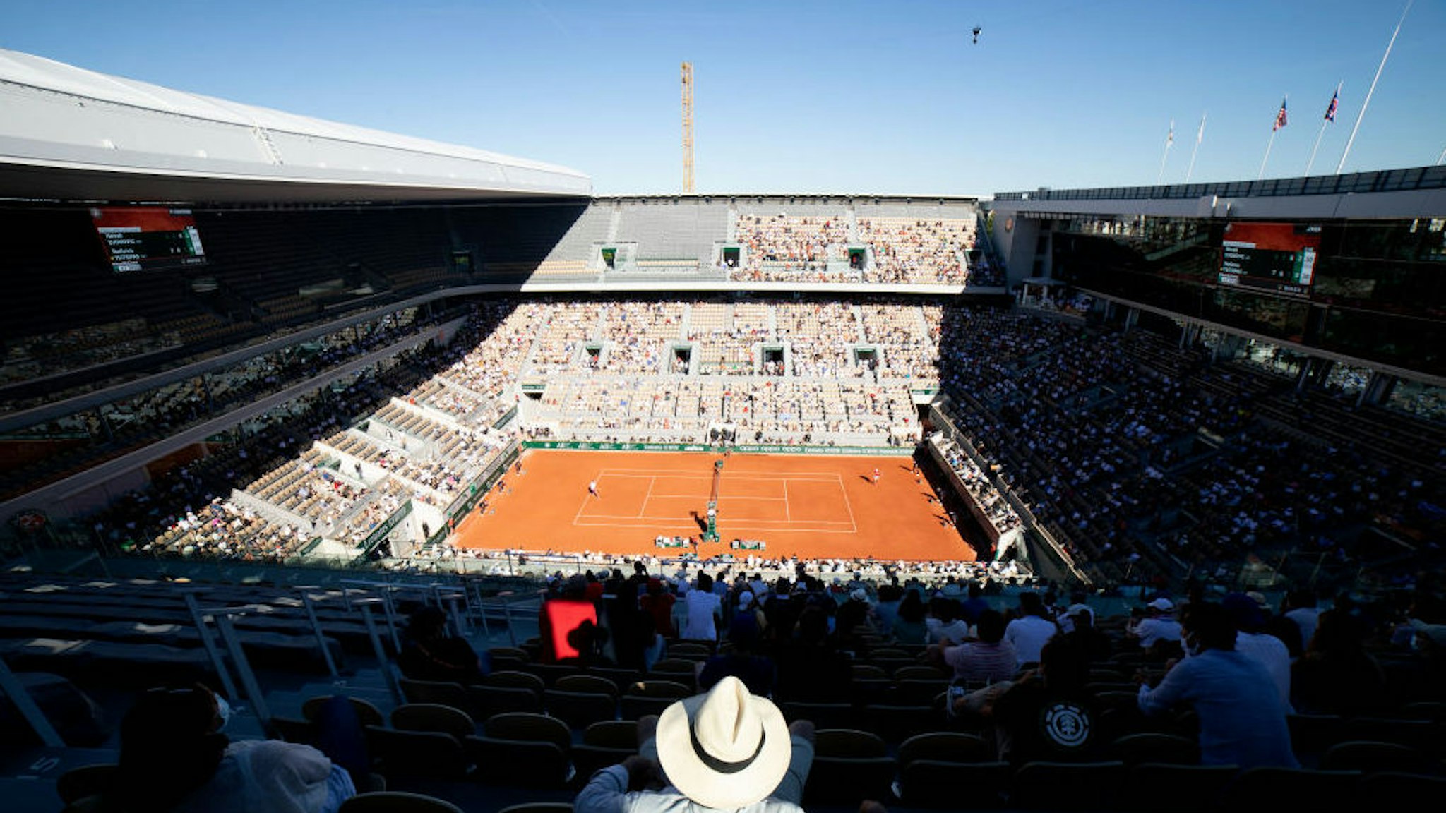 PARIS, FRANCE June 13. A general panoramic view of Novak Djokovic of Serbia in action against Stefanos Tsitsipas of Greece on Court Philippe-Chatrier during the Men's Singles Final at the 2021 French Open Tennis Tournament at Roland Garros on June 13th 2021 in Paris, France. (Photo by Tim Clayton/Corbis via Getty Images)