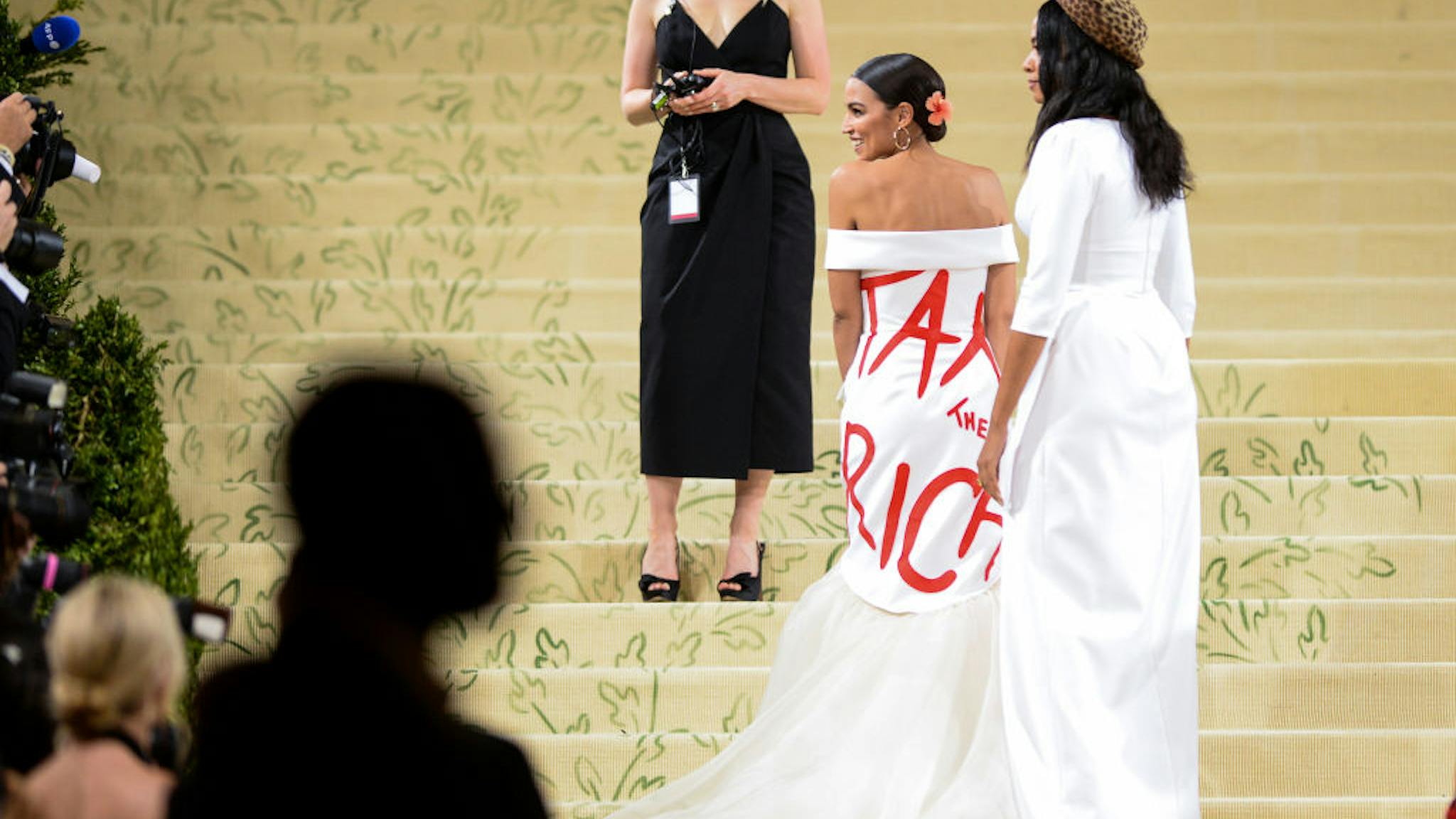 The 2021 Met Gala Celebrating In America: A Lexicon Of Fashion – Street Sightings NEW YORK, NEW YORK - SEPTEMBER 13: Congresswoman Alexandria Ocasio-Cortez (D-NY) attends the 2021 Met Gala Celebrating In America: A Lexicon Of Fashion at the Metropolitan Museum Of Art on September 13, 2021 in New York City. (Photo by Ray Tamarra/GC Images)