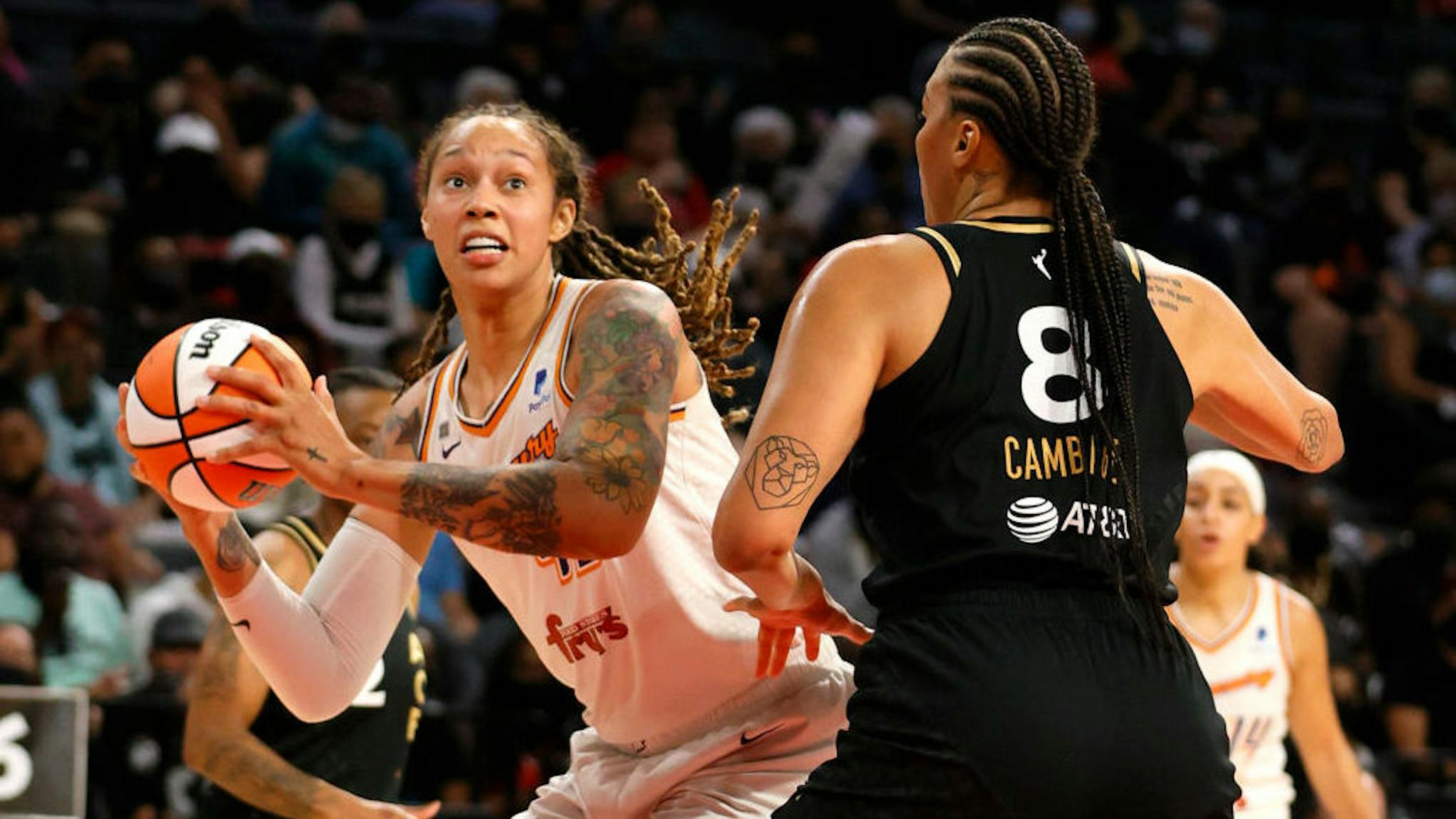 Phoenix Mercury v Las Vegas Aces – Game Five LAS VEGAS, NEVADA - OCTOBER 08: Brittney Griner #42 of the Phoenix Mercury drives to the basket against Liz Cambage #8 of the Las Vegas Aces during Game Five of the 2021 WNBA Playoffs semifinals at Michelob ULTRA Arena on October 8, 2021 in Las Vegas, Nevada. NOTE TO USER: User expressly acknowledges and agrees that, by downloading and or using this photograph, User is consenting to the terms and conditions of the Getty Images License Agreement. (Photo by Ethan Miller/Getty Images)