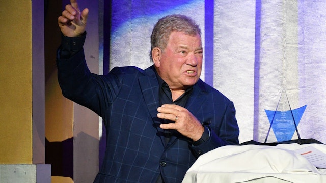 ANAHEIM, CALIFORNIA - OCTOBER 21: William Shatner speaks on stage before presenting the 2021 Mensch of the Year award to Scott Seigel during the Late Night With Solomon Society charity event at City National Grove of Anaheim on October 21, 2021 in Anaheim, California. (Photo by Allen Berezovsky/Getty Images)
