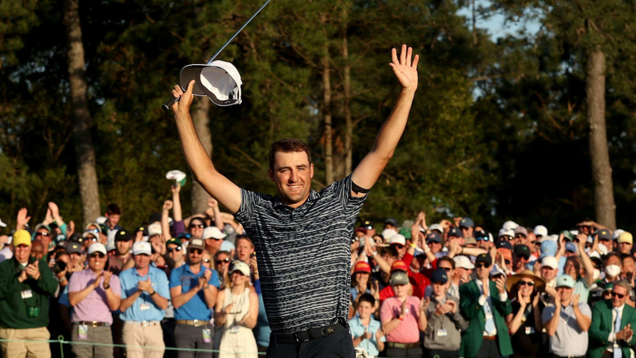 AUGUSTA, GEORGIA - APRIL 10: Scottie Scheffler of the United States celebrates on the 18th green after winning during the final round of the Masters at Augusta National Golf Club on April 10, 2022 in Augusta, Georgia. (Photo by Jamie Squire/Getty Images)