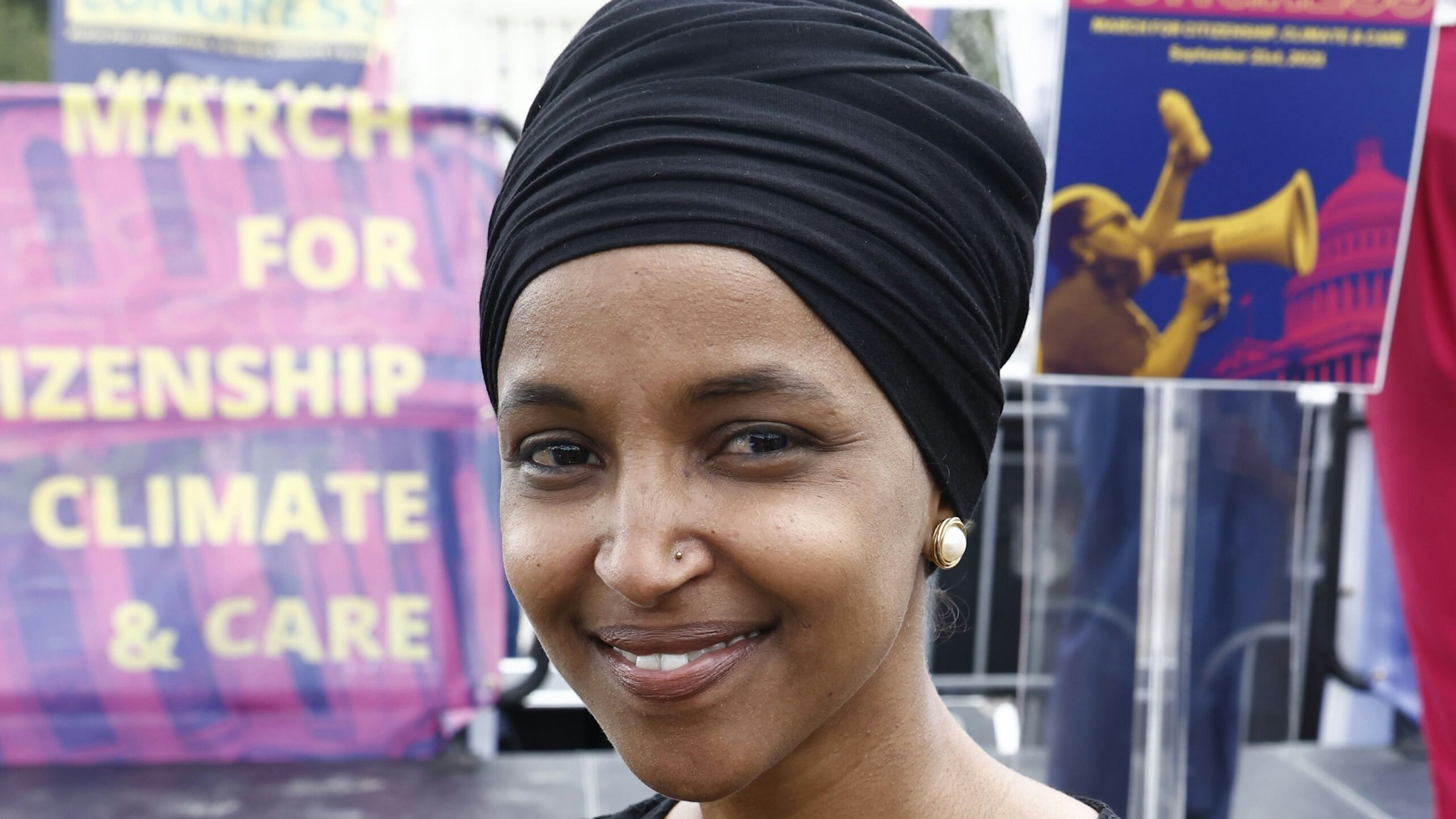 WASHINGTON, DC - SEPTEMBER 21: U.S. Rep. Ilhan Omar (D-MN) is seen backstage as thousands welcome back Congress by marching for Citizenship, Care, And Climate Justice on September 21, 2021 in Washington, DC.