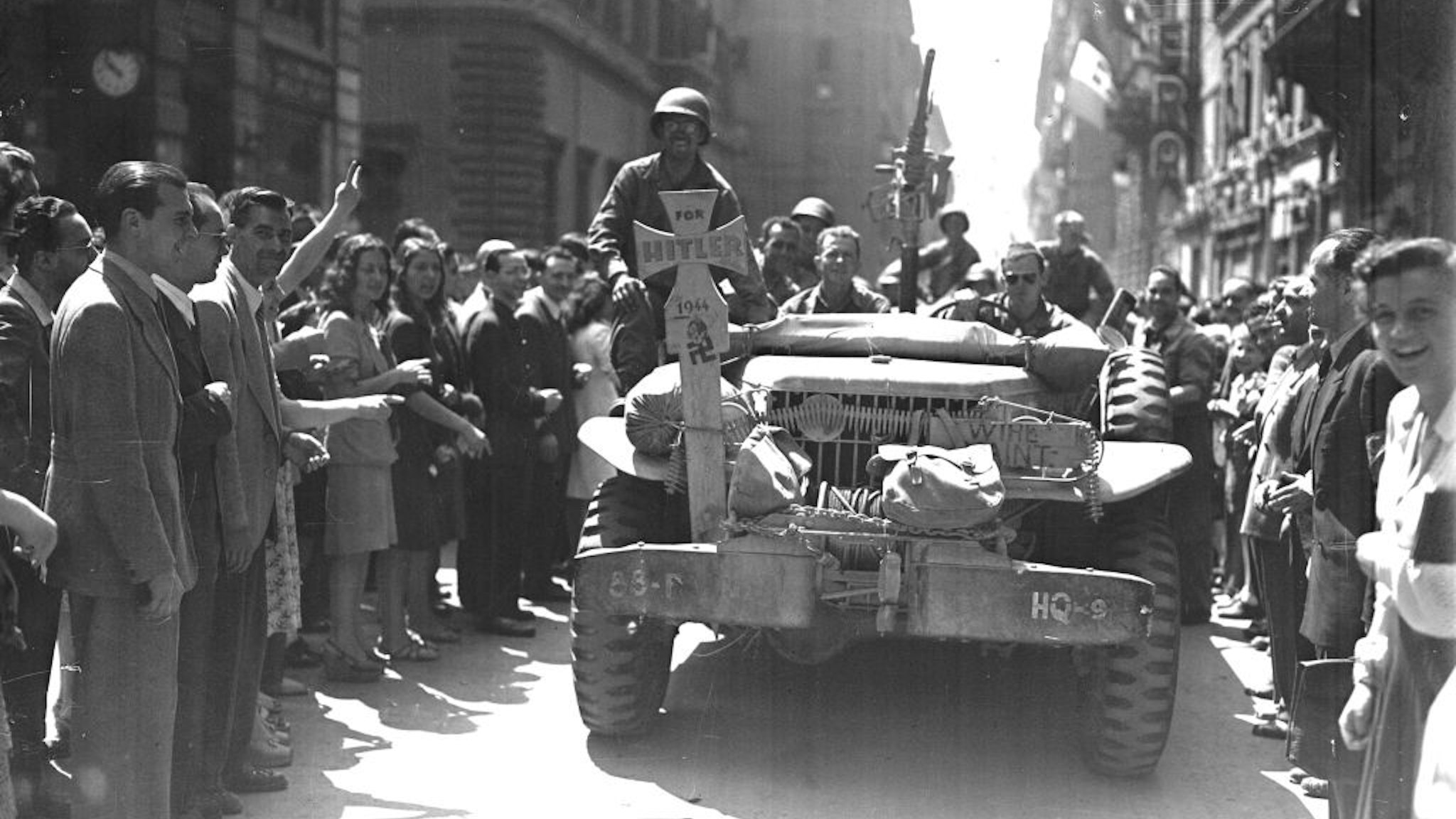 June 4, 1944. Rome, Italy, American soldiers driving down Via del Corso.