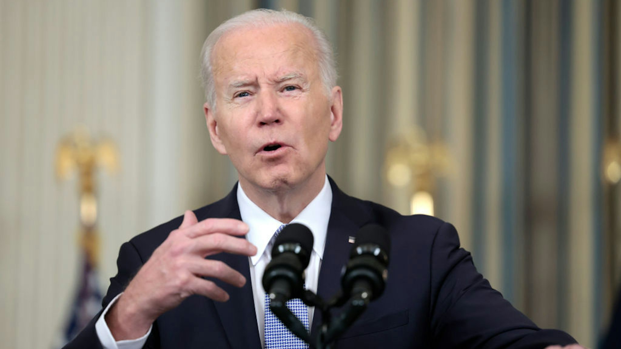 WASHINGTON, DC - APRIL 01: U.S. President Joe Biden gestures as he delivers remarks on the jobs report for the month of March from the State Dining Room of the White House on April 01, 2022 in Washington, DC. The U.S. economy gained an additional 431,000 jobs in March and the unemployment rate fell to 3.6%. (Photo by Anna Moneymaker/Getty Images)