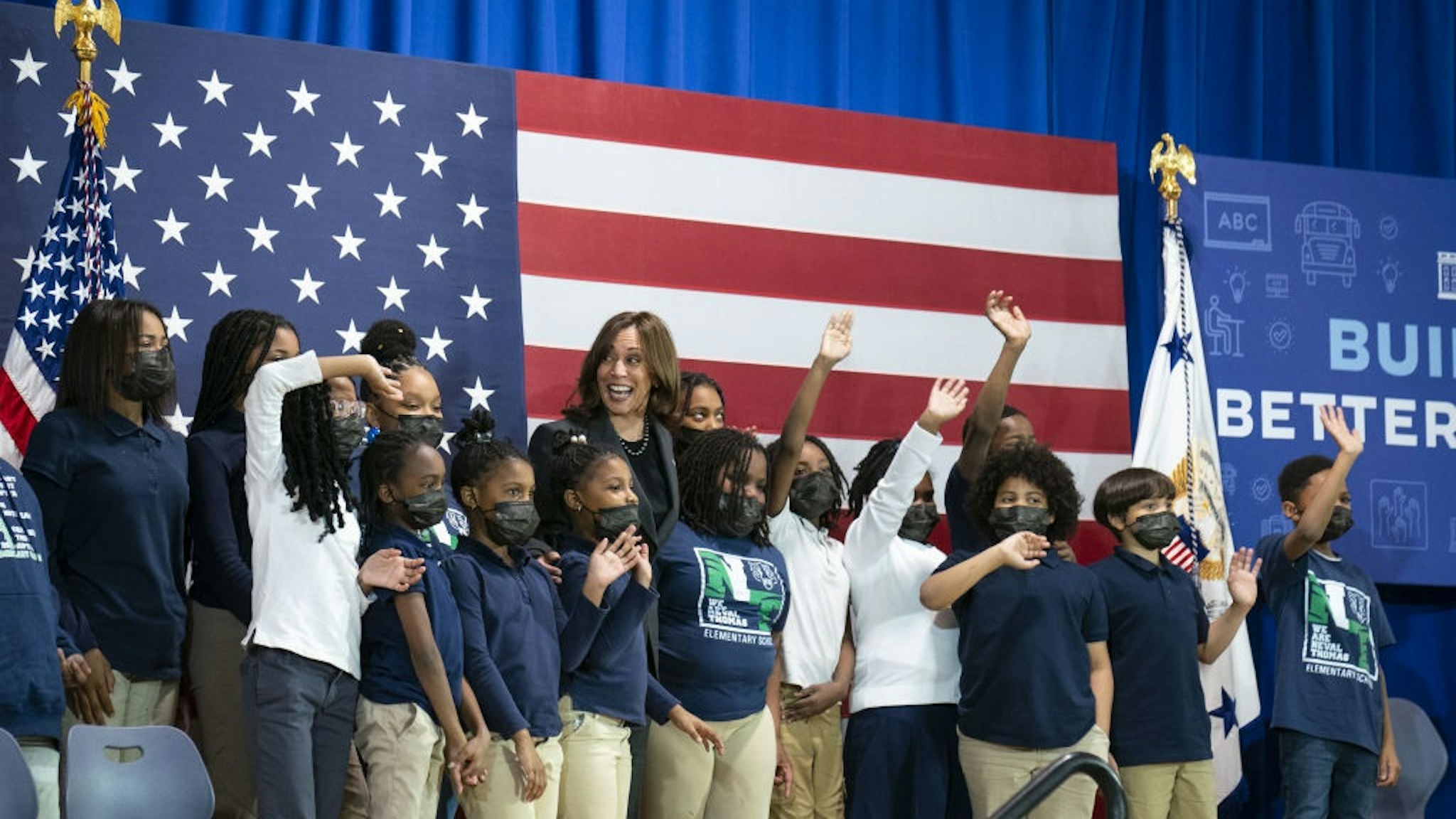 U.S. Vice President Kamala Harris takes a photo with students at Thomas Elementary School in Washington, D.C., U.S., on Monday, April 4, 2022.