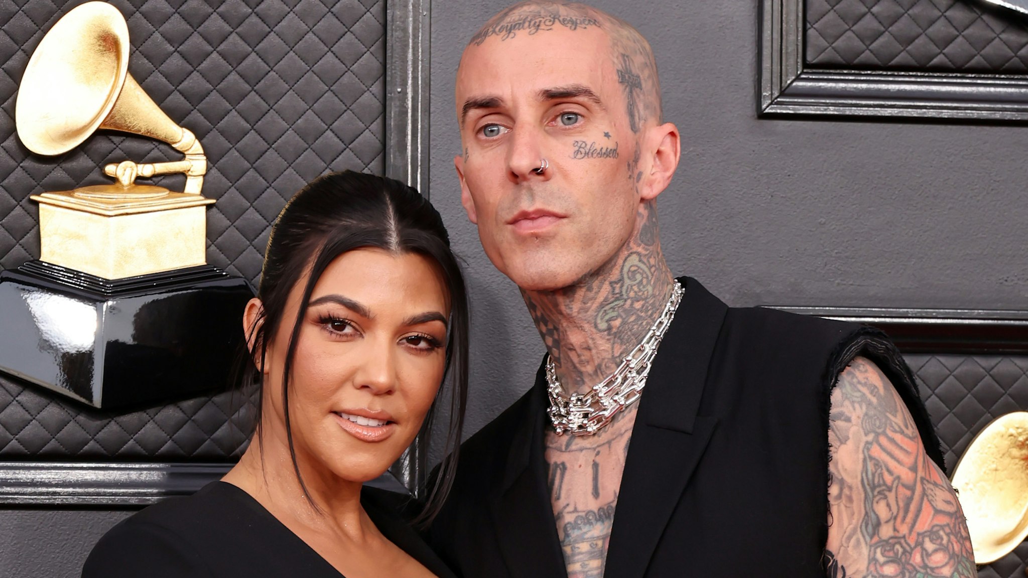 (L-R) Kourtney Kardashian and Travis Barker attend the 64th Annual GRAMMY Awards at MGM Grand Garden Arena on April 03, 2022 in Las Vegas, Nevada.