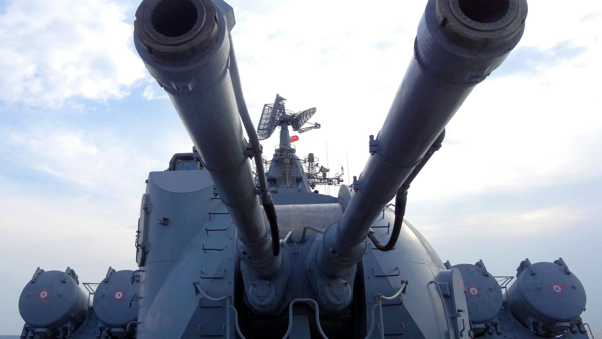 A picture shows an artillery system on the Russian missile cruiser Moskva in the Mediterranean Sea, off the coast of Syria, on December 17, 2015. Russia began its air war in Syria on September 30, conducting air strikes against a range of anti-regime armed groups including US-backed rebels and jihadist groups. Moscow has said it is fighting and other "terrorist groups," but its campaign has come under fire by Western officials who accuse the Kremlin of seeking to prop up Syrian President Bashar al-Assad.