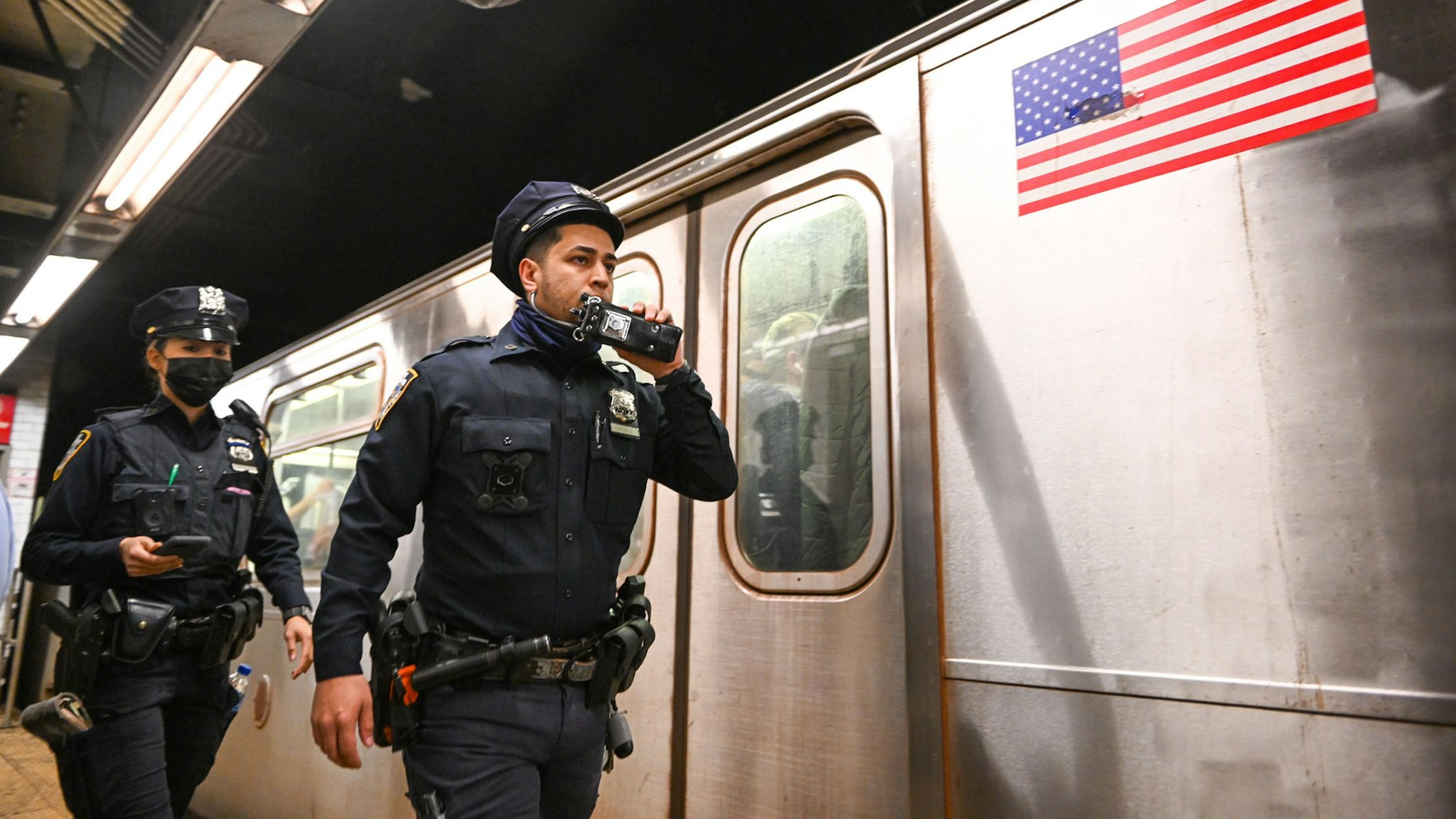 NEW YORK, NEW YORK - APRIL 12: New York City police investigate an incident on an Uptown 4 subway after an emergency brake was pulled near Union Square on April 12, 2022 in New York City. Security has been heightened after a gunman in a gas mask and construction vest set off a smoke grenade and opened fire on a subway today at the 36th Street and Fourth Avenue station in the Sunset Park neighborhood of Brooklyn. At least 29 people were injured - 10 of them by gunshot - amid a fusillade of 33 rounds, according to reports. Authorities have named 62-year-old Philadelphia man Frank R. James as a person of interest.