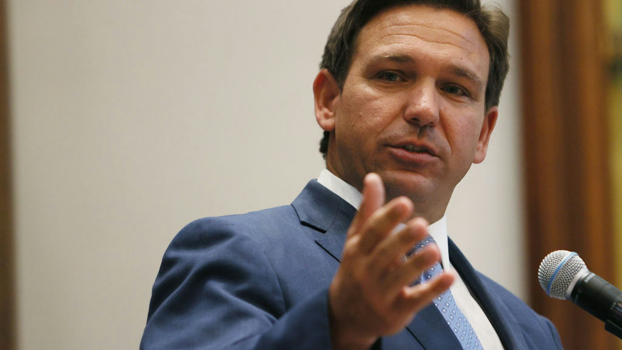 SURFSIDE, FLORIDA - JUNE 14: Florida Gov. Ron DeSantis speaks during a press conference at the Shul of Bal Harbour on June 14, 2021 in Surfside, Florida. The governor spoke about the two bills he signed HB 529 and HB 805. HB 805 ensures that volunteer ambulance services, including Hatzalah, can operate. HB 529 requires Florida schools to hold a daily moment of silence.