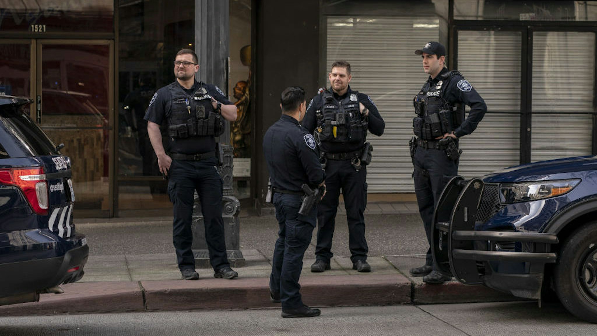 Seattle Police Department officers patrol near a mobile precinct location on Third Avenue in downtown Seattle, Washington, U.S., on Thursday, March 24, 2022. Amazon is temporarily shuttering an office in the area as police increase their presence downtown. Seattle's new mayor, Bruce Harrell, swept into office on a law-and-order platform that also pledged to stem rising homelessness, crime has instead worsened downtown and the area's post-Covid rebound is lagging behind other parts of the city. Photographer: David Ryder/Bloomberg via Getty Images