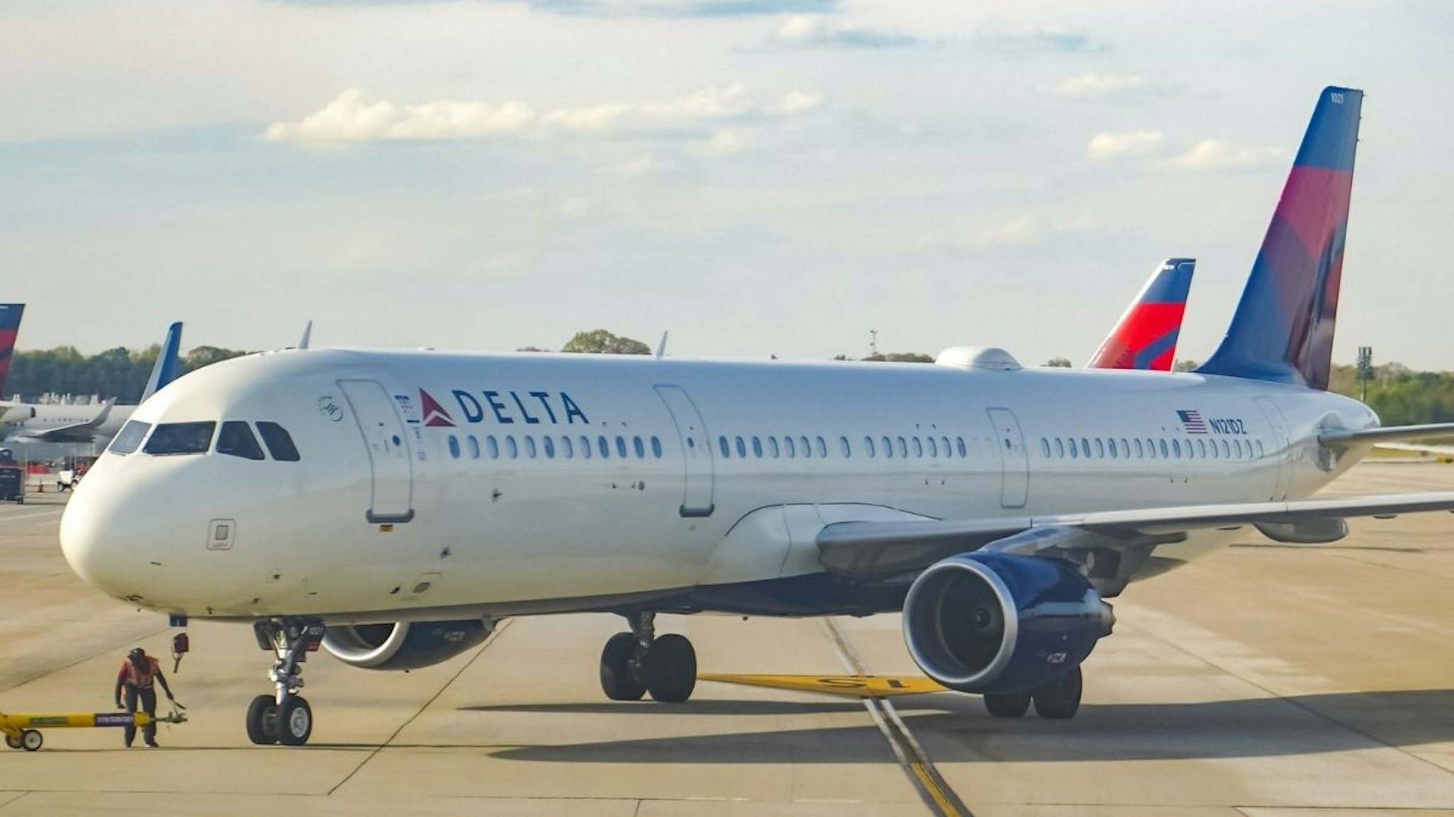 A Delta airlines airplane is seen parked at Hartsfield-Jackson International Airport in Atlanta.