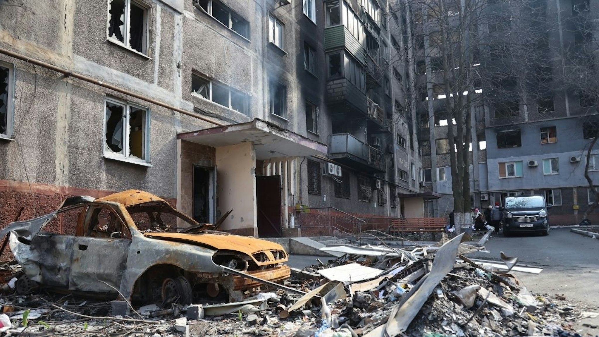 A view of destroyed buildings and a vehicle during ongoing conflicts in the city of Mariupol under the control of the Russian military and pro-Russian separatists, on April 09, 2022.