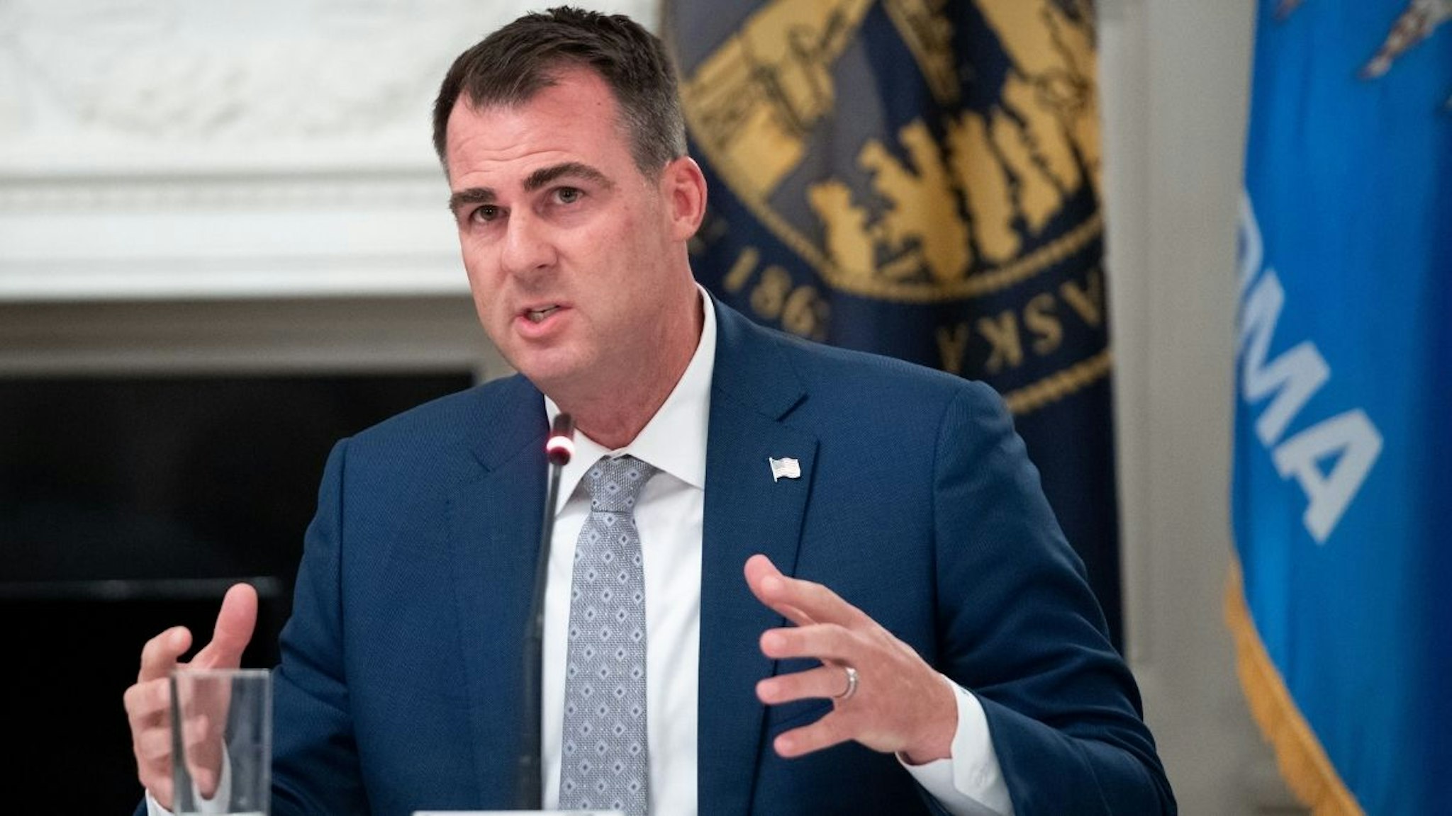 Oklahoma Governor Kevin Stitt speaks during a roundtable discussion with US President Donald Trump about economic reopening of closures due to COVID-19, known as coronavirus, in the State Dining Room of the White House in Washington, DC, June 18, 2020.